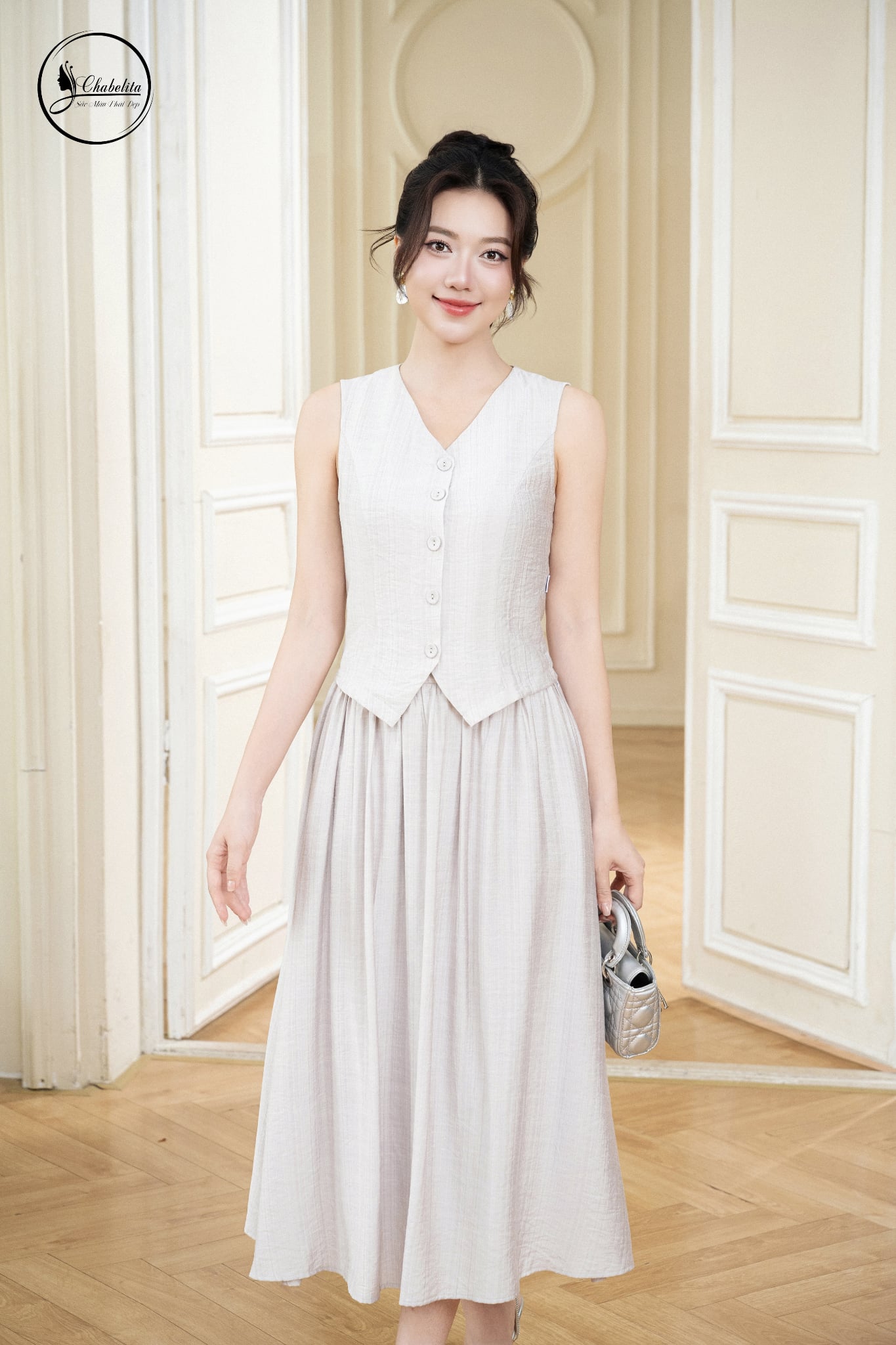 Sét bộ áo sát nách cổ tim phối chân váy màu xám