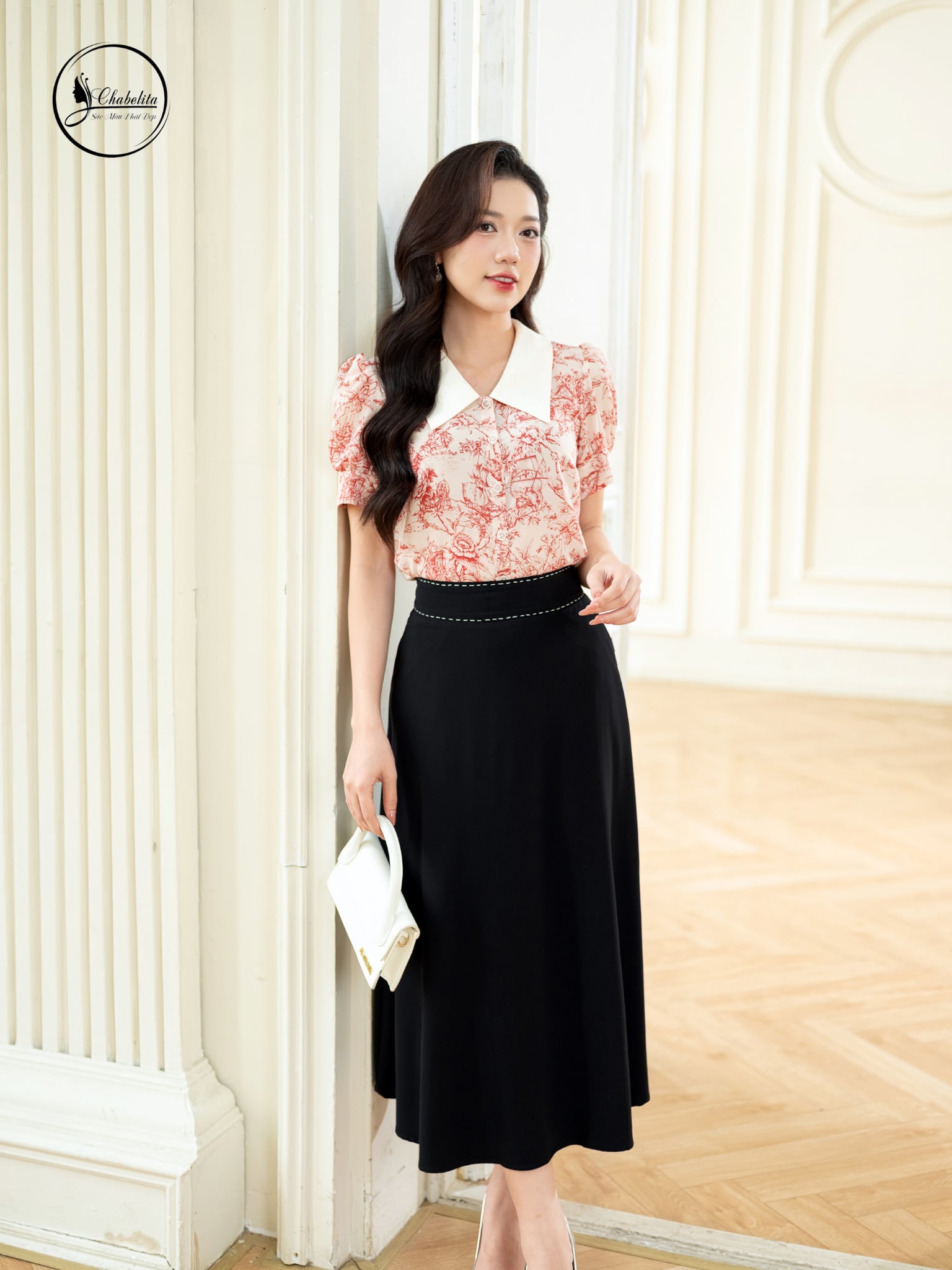 Chân váy xòe cạp đột chỉ màu đen