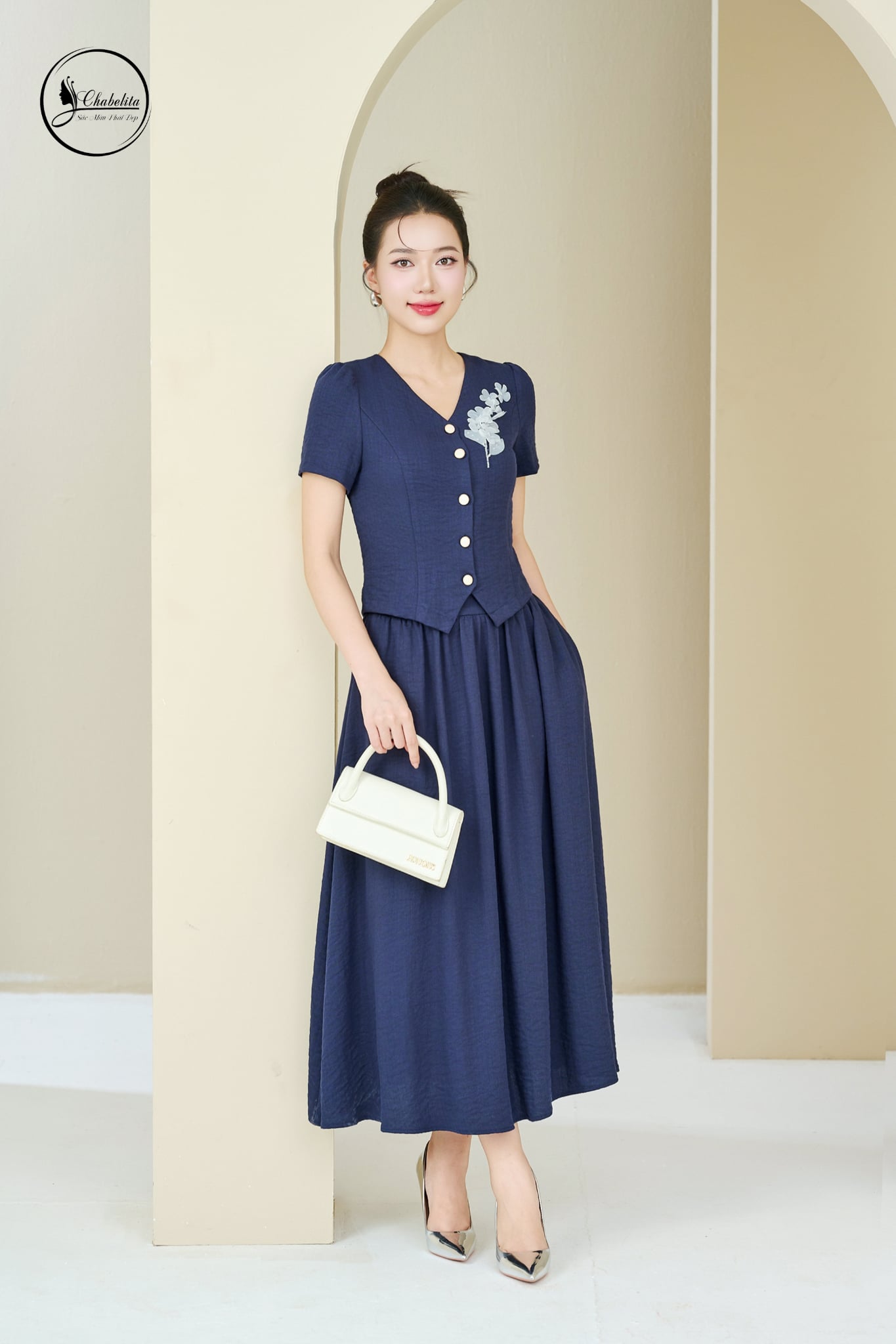 Sét bộ áo tay cộc cổ tim phối chân váy màu xanh than