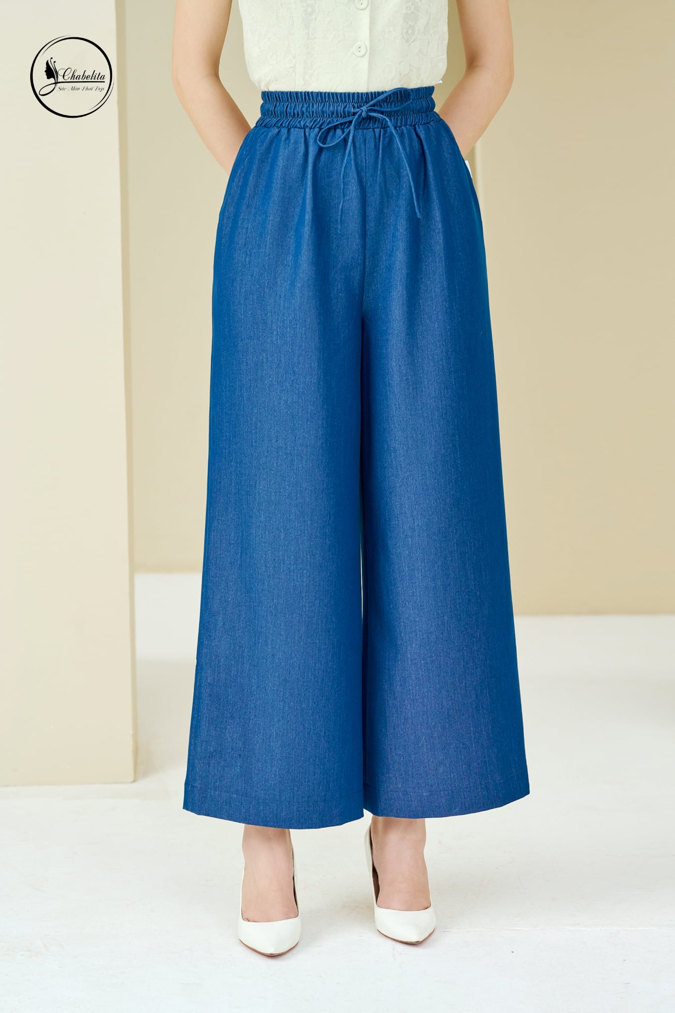 Quần bò suông cạp chun màu xanh