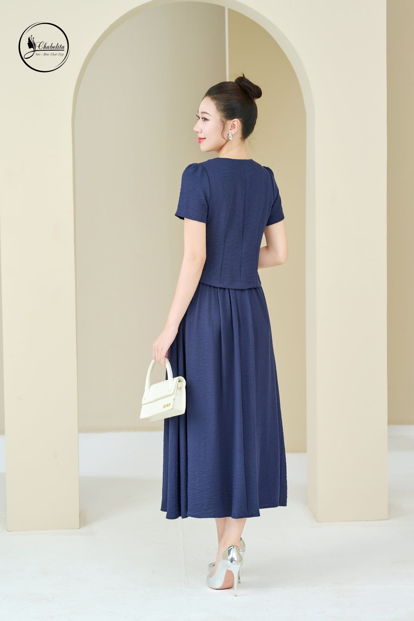 Sét bộ áo tay cộc cổ tim phối chân váy màu xanh than