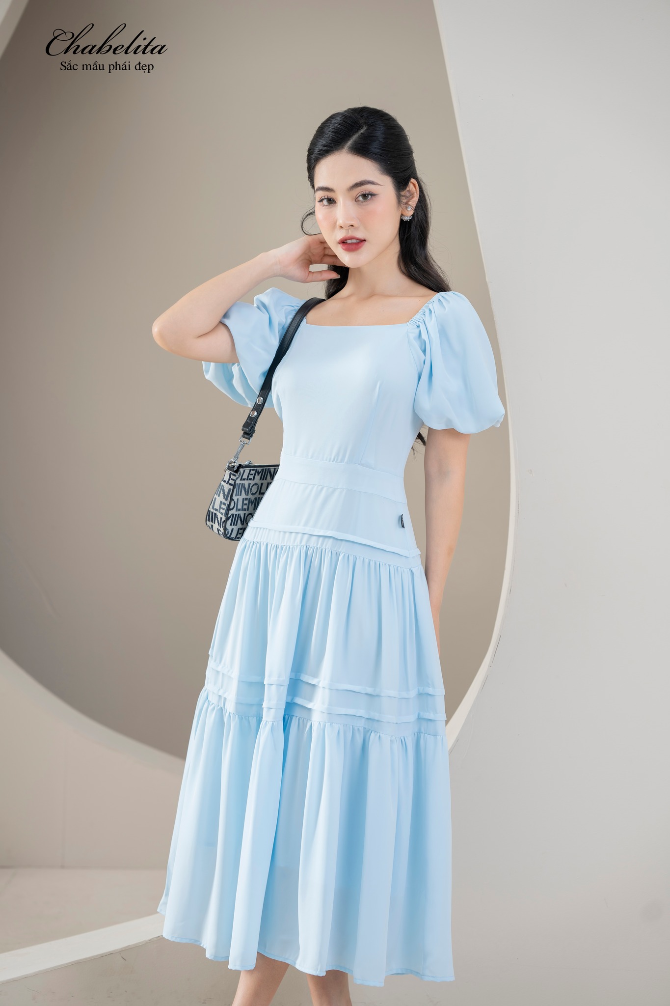 Đầm cổ vuông bèo tầng màu xanh