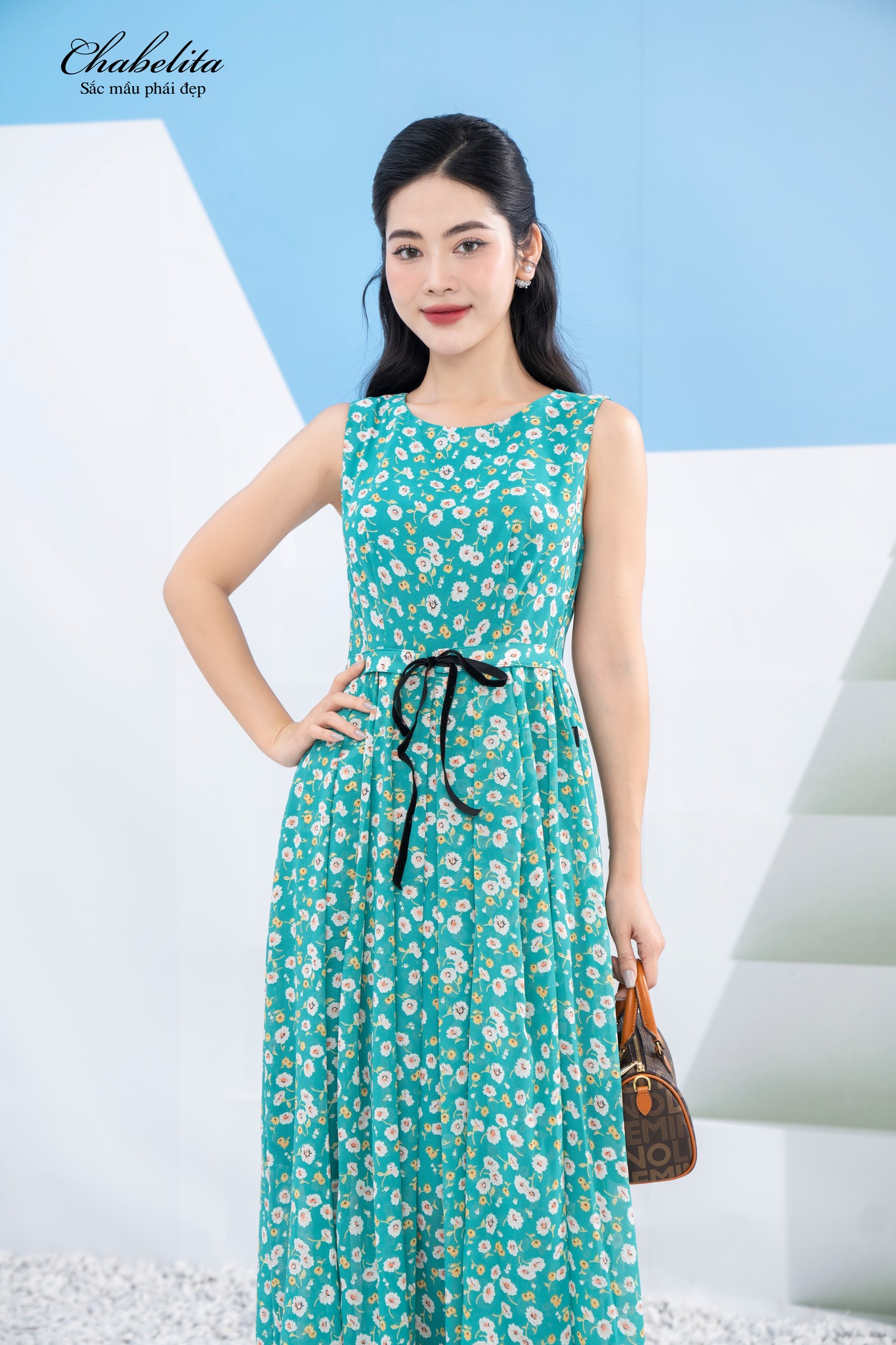 Đầm sát nách dây eo hoa xanh