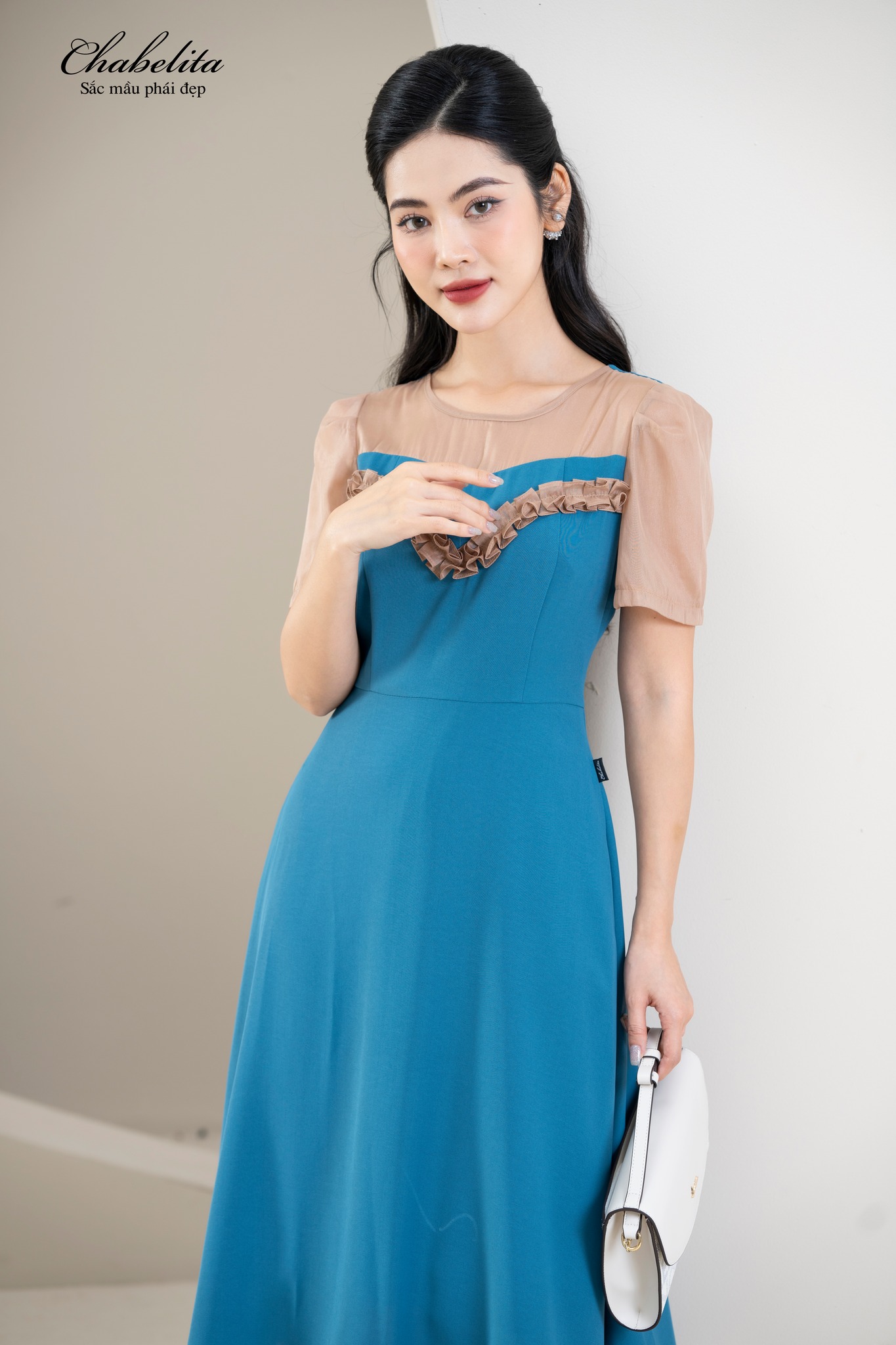 Đầm phối viền màu xanh