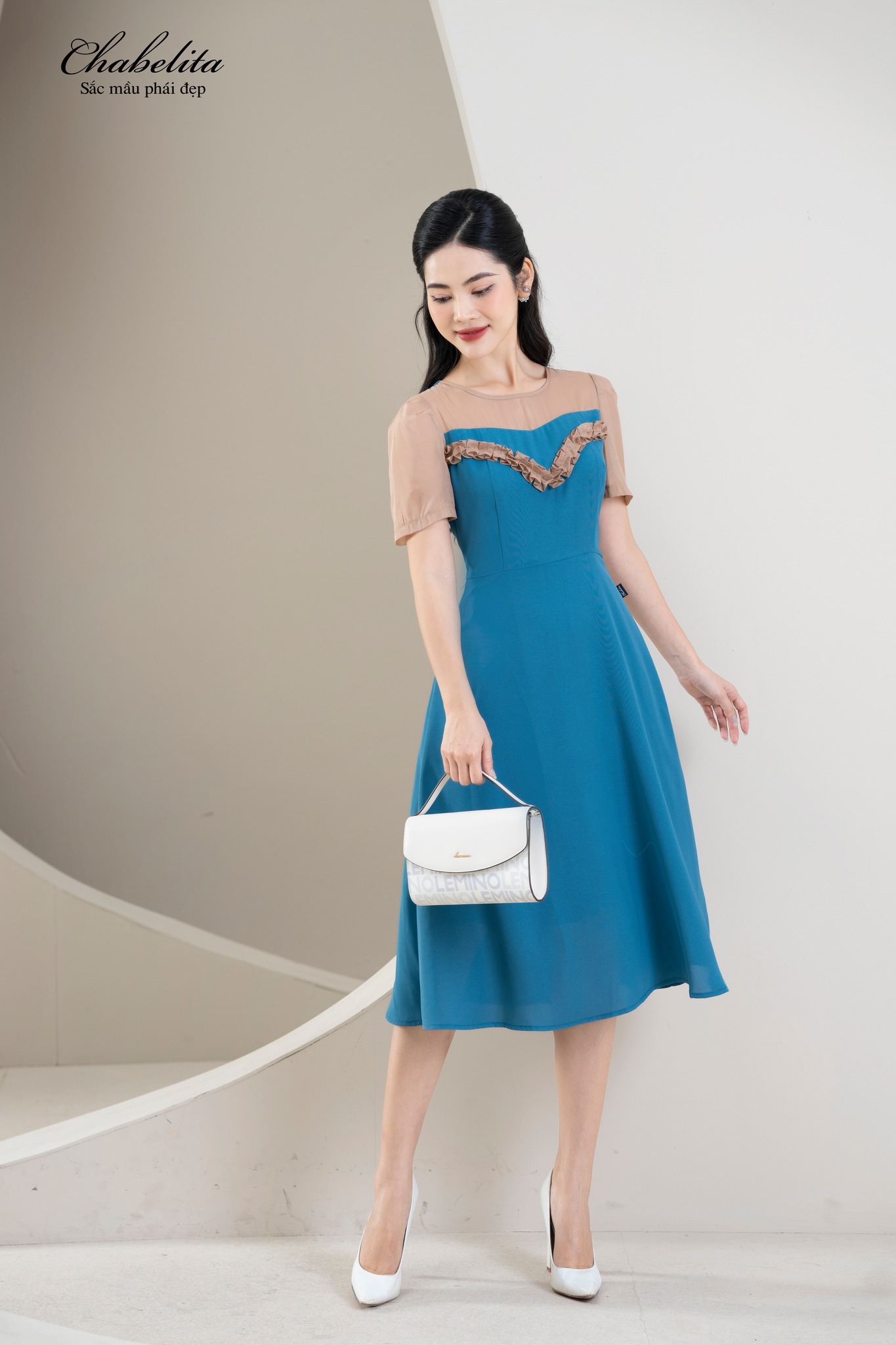 Đầm phối viền màu xanh