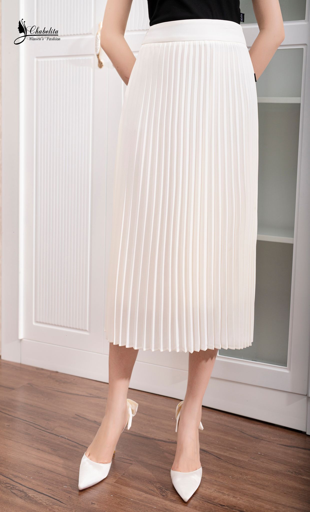 Chân váy dập ly dẻ quạt màu trắng