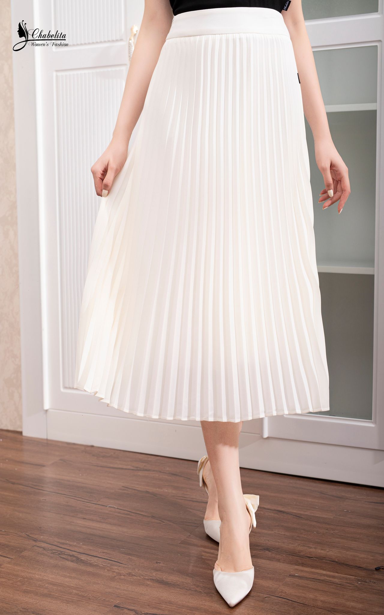 Chân váy dập ly dẻ quạt màu trắng