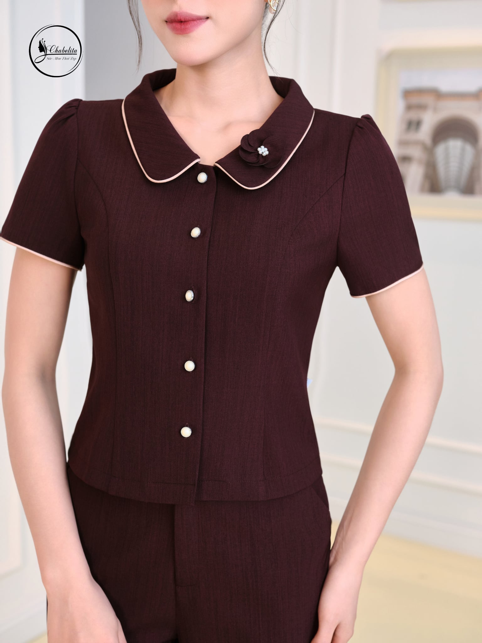 Áo sơ mi cổ sen phối viền đính hoa màu tím