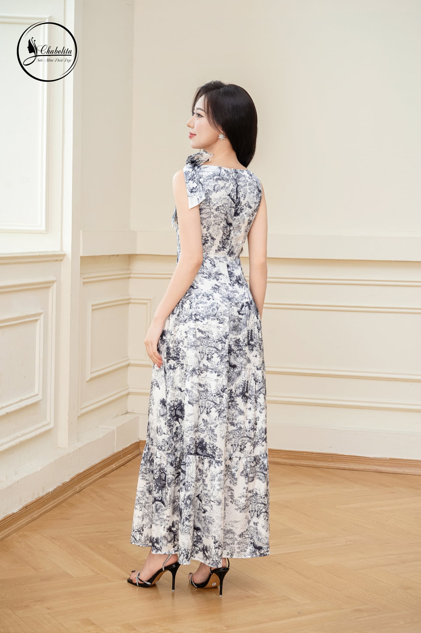 Đầm sát nách họa tiết đính nơ