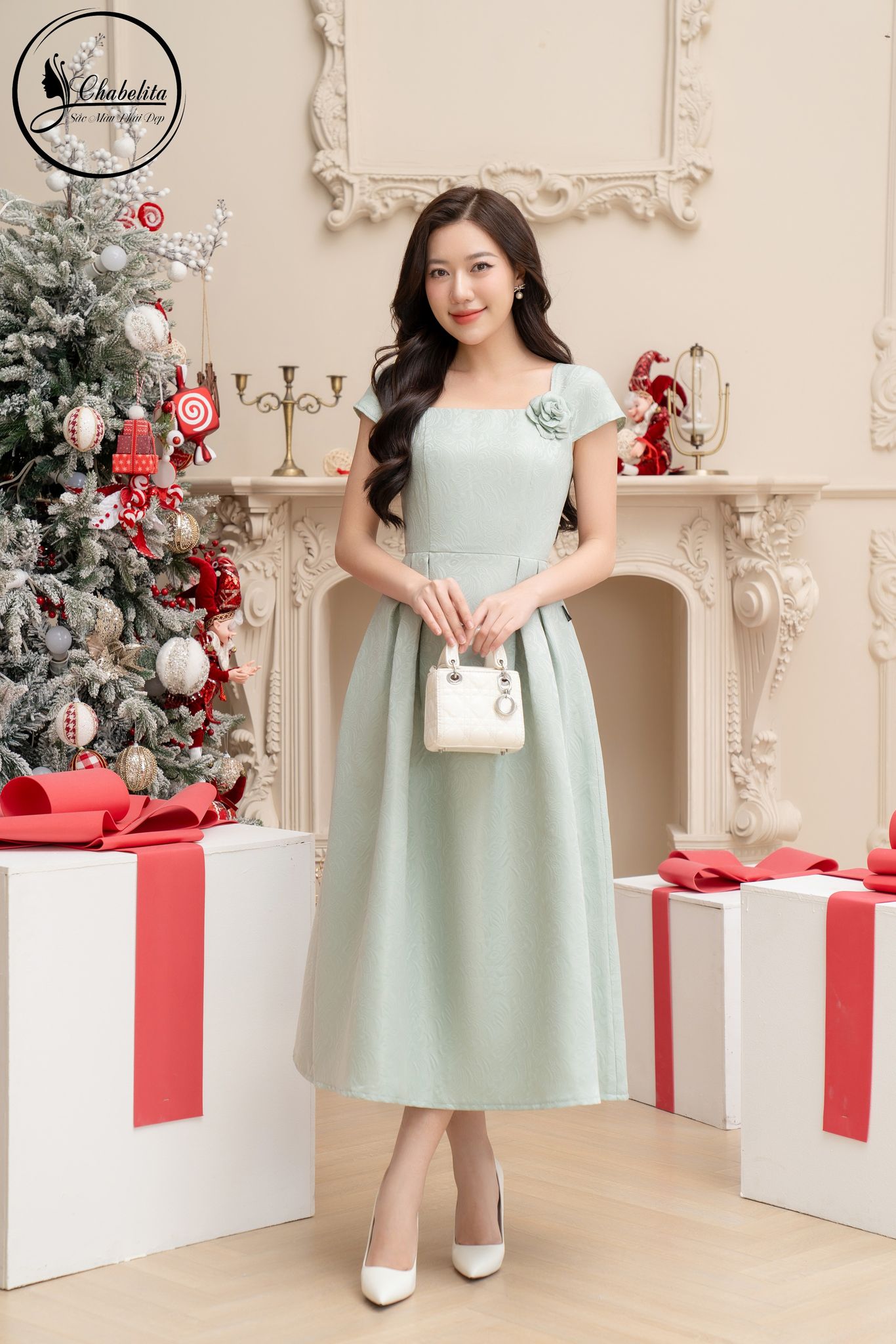 Đầm gấm màu xanh