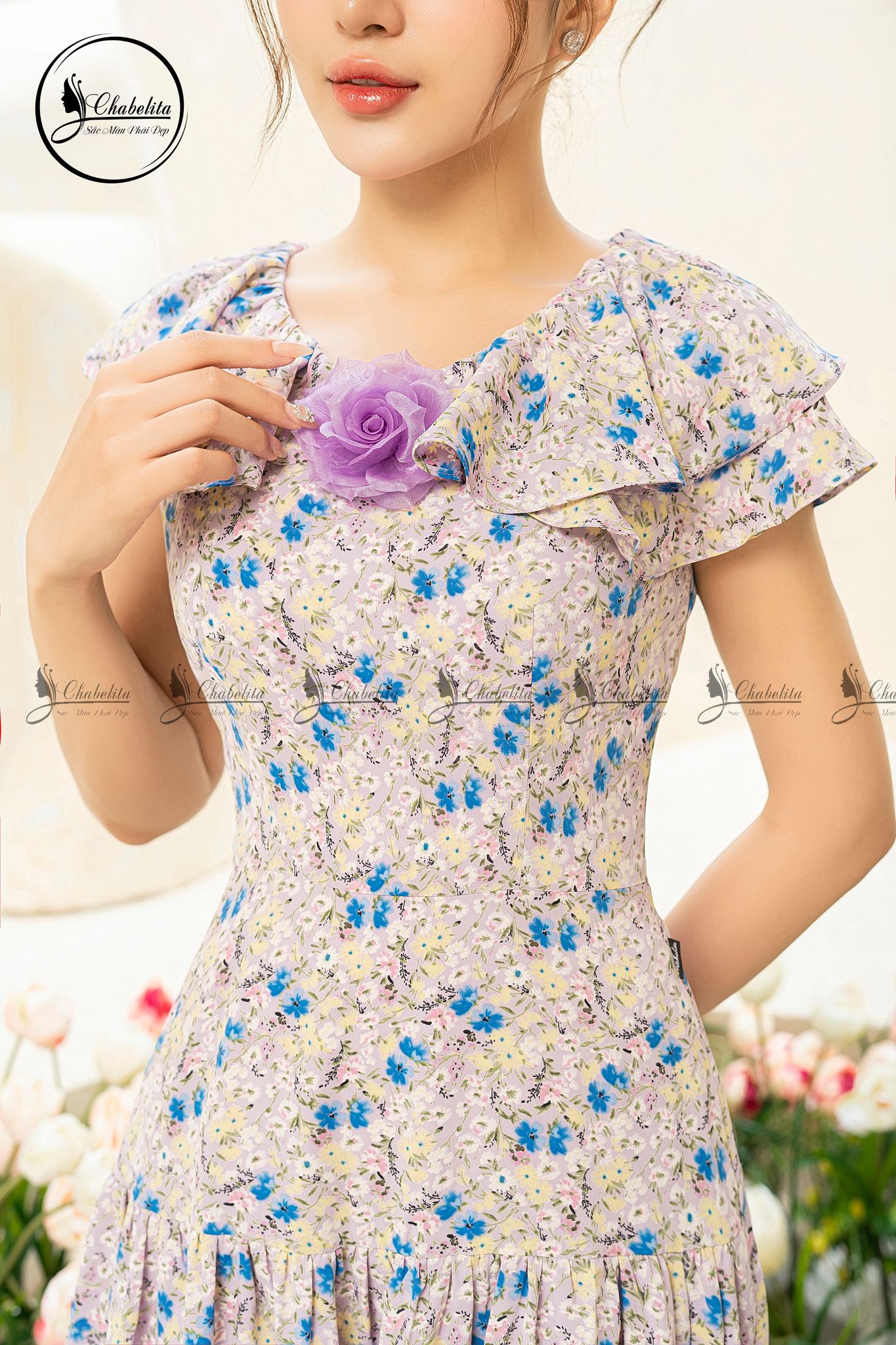 Đầm hoa sát nách đính hoa ngực màu tím