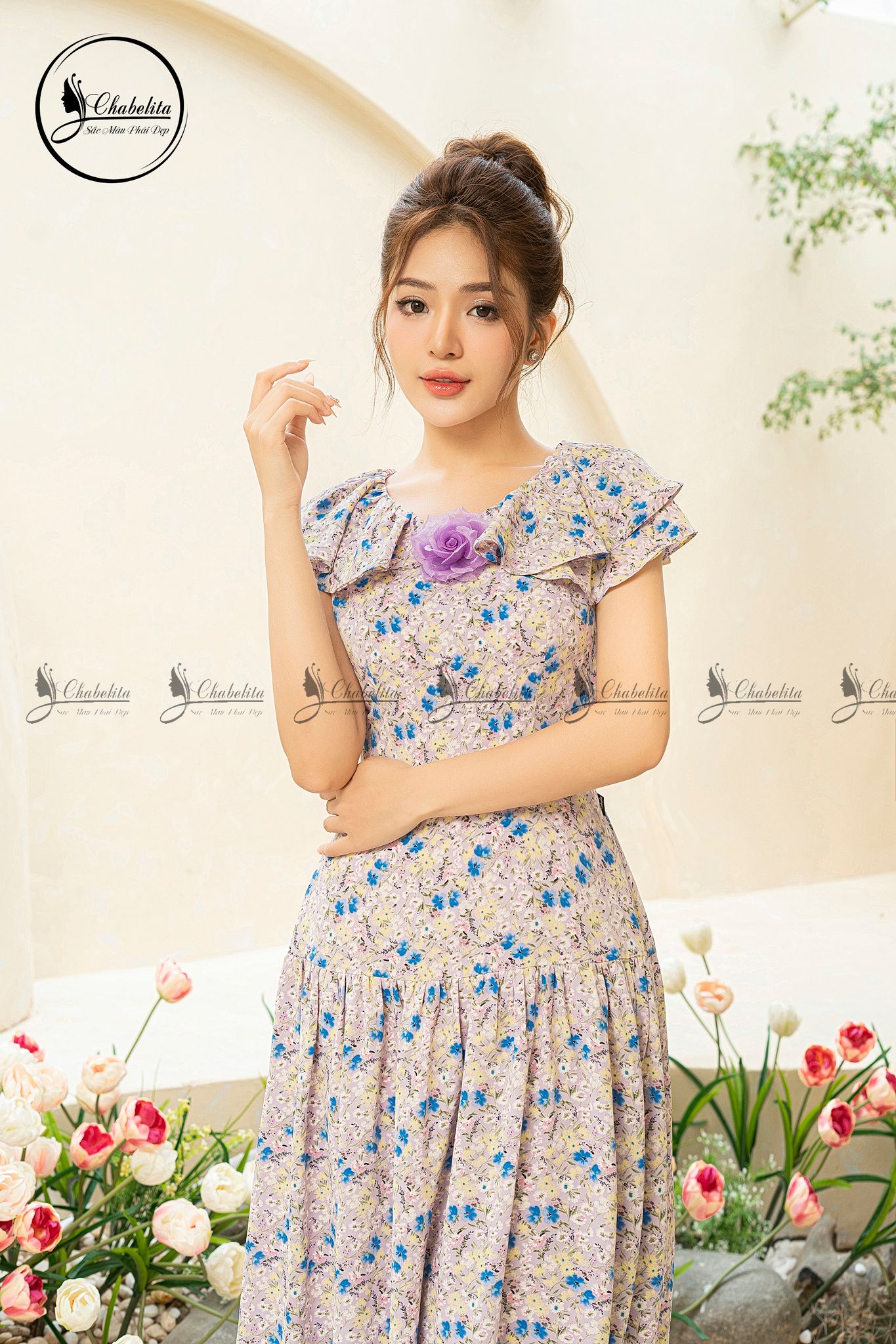 Đầm hoa sát nách đính hoa ngực màu tím