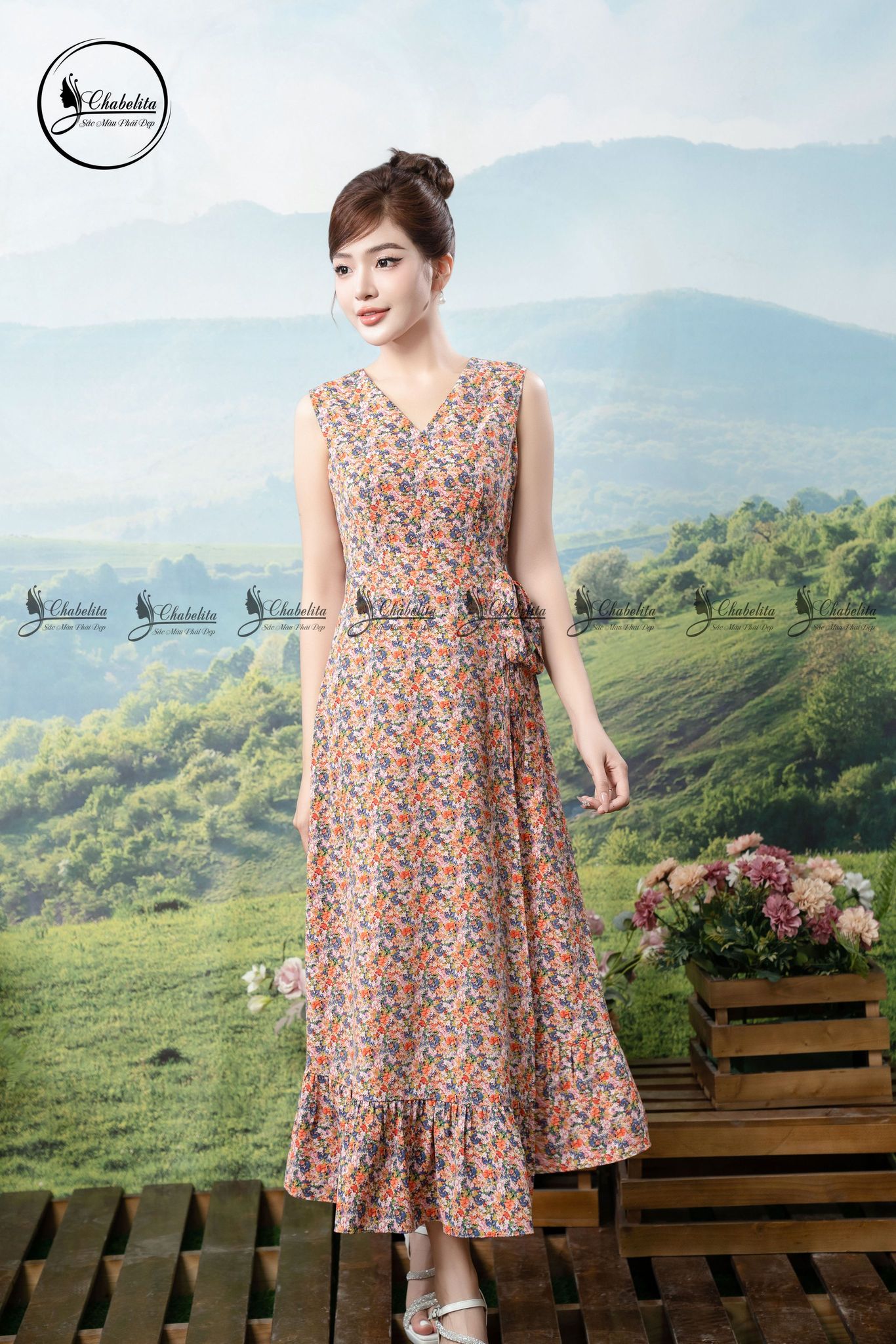 Đầm hoa xòe cổ tim sát nách eo phối nơ màu cam