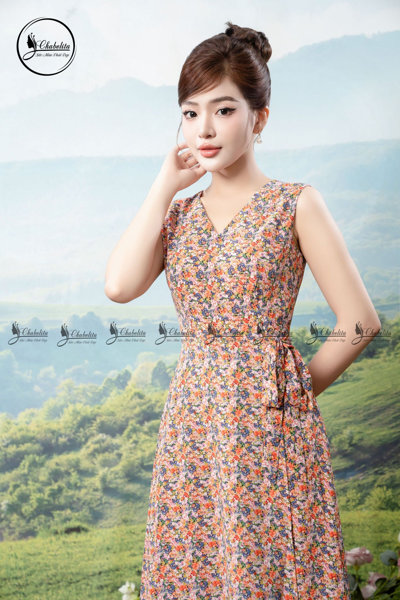 Đầm hoa xòe cổ tim sát nách eo phối nơ màu cam