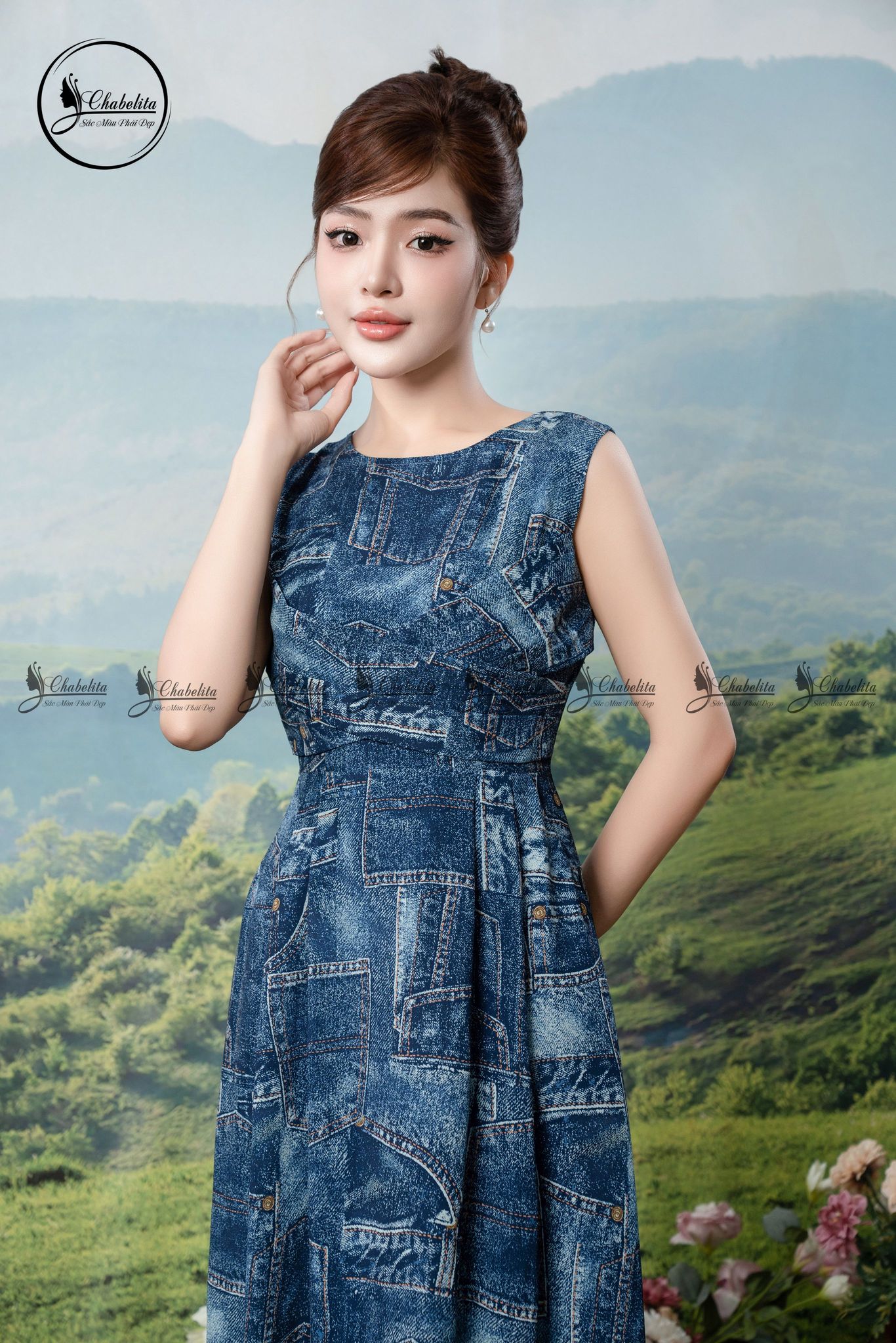 Đầm sát nách họa tiết phối dây chéo eo màu xanh