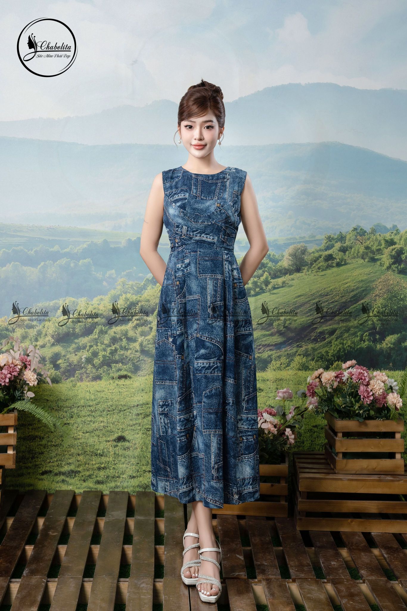 Đầm sát nách họa tiết phối dây chéo eo màu xanh