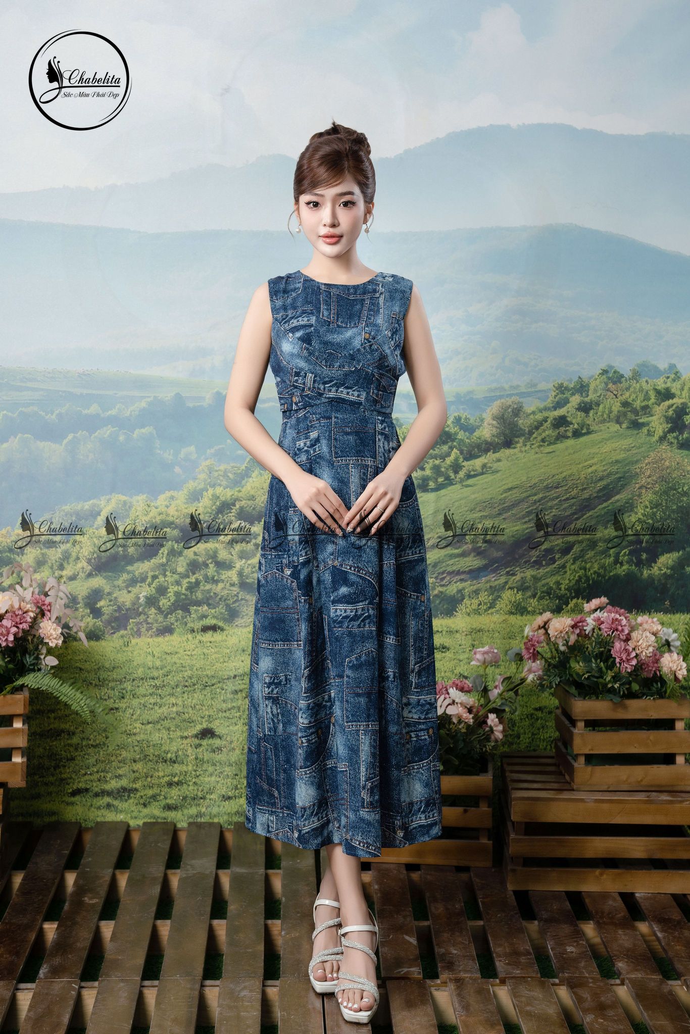 Đầm sát nách họa tiết phối dây chéo eo màu xanh