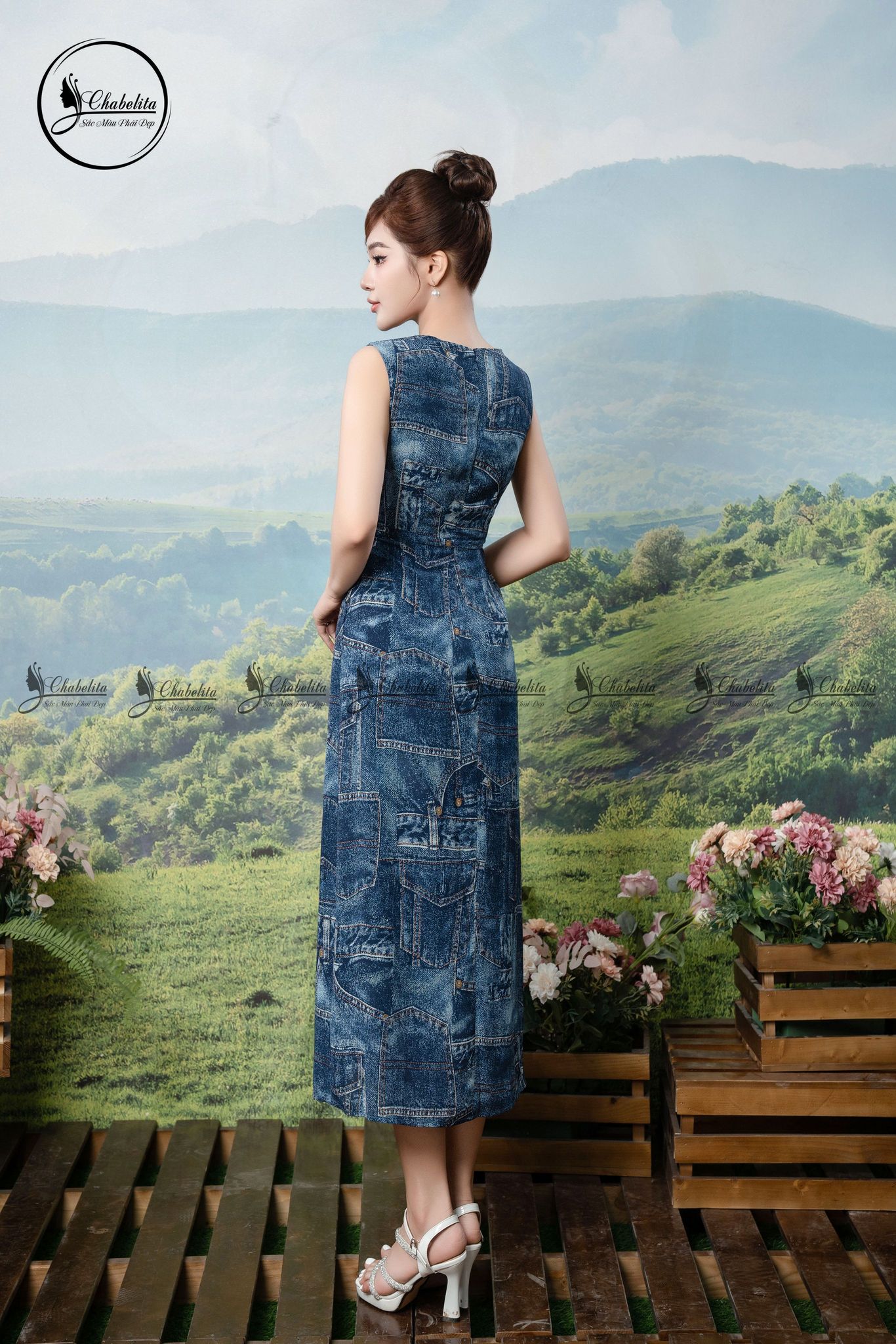 Đầm sát nách họa tiết phối dây chéo eo màu xanh