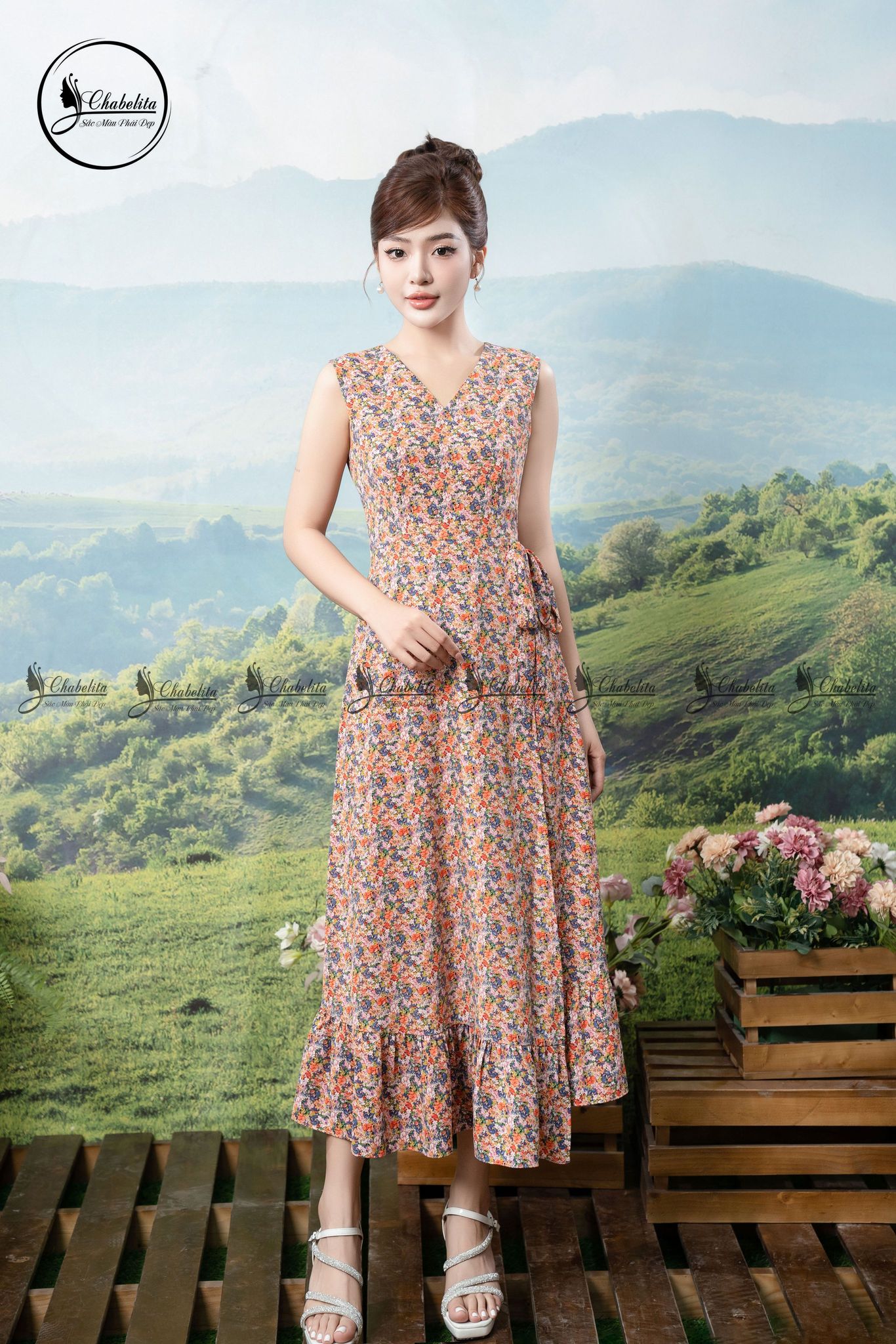 Đầm hoa xòe cổ tim sát nách eo phối nơ màu cam