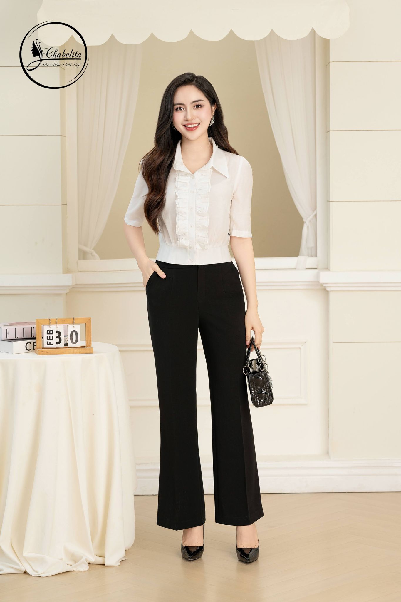 Áo sơ mi xếp ly bèo ngực màu trắng