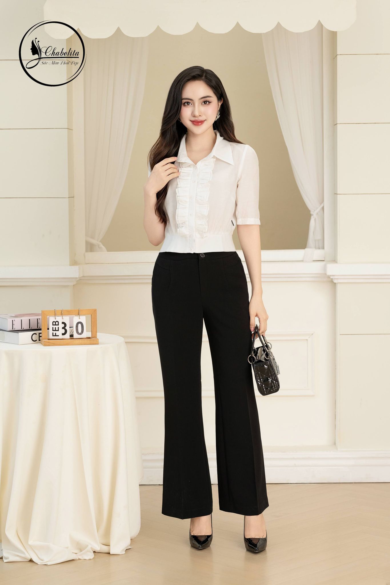 Áo sơ mi xếp ly bèo ngực màu trắng