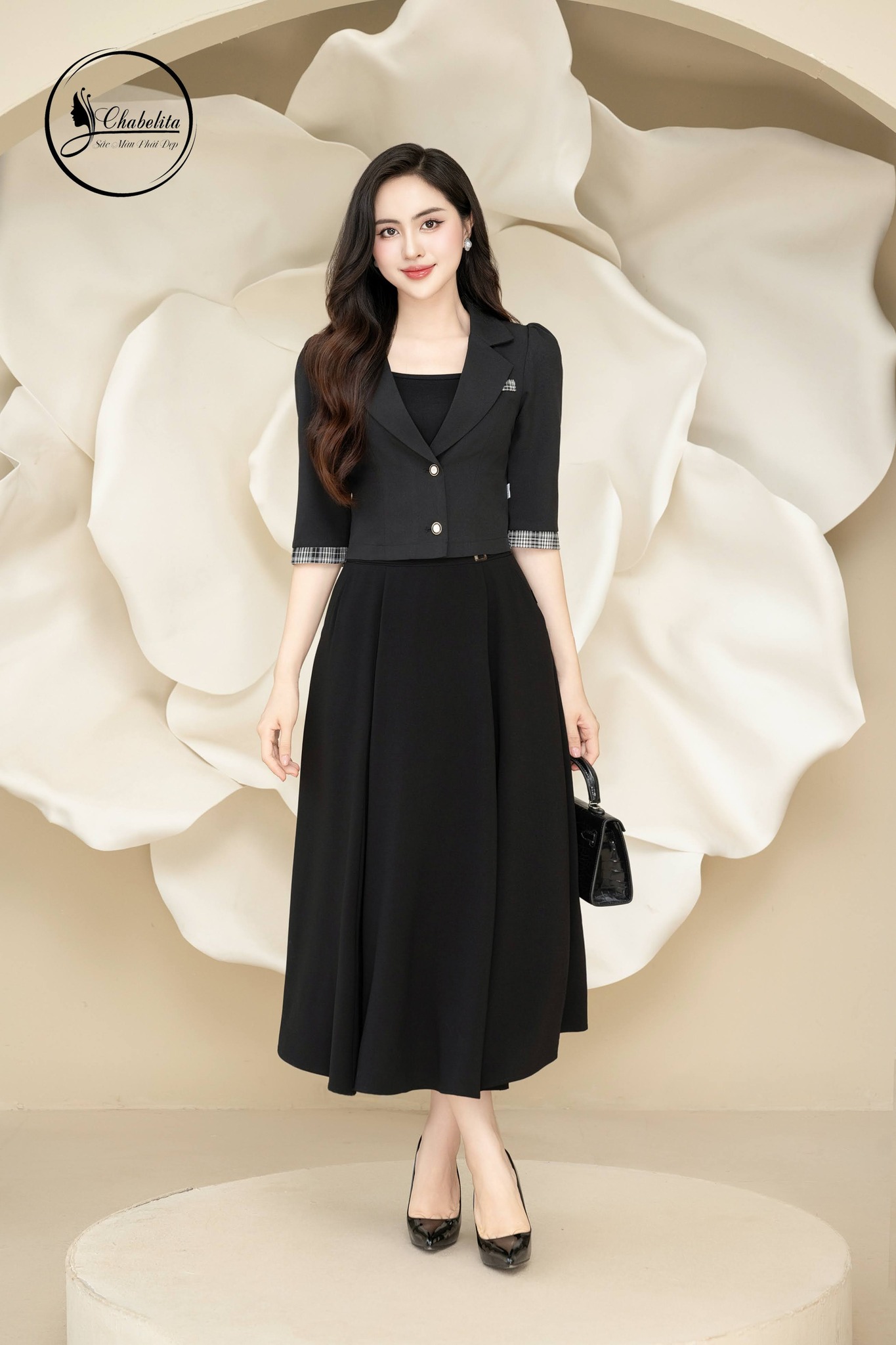 Áo vest nữ dài tay 2 cúc màu đen