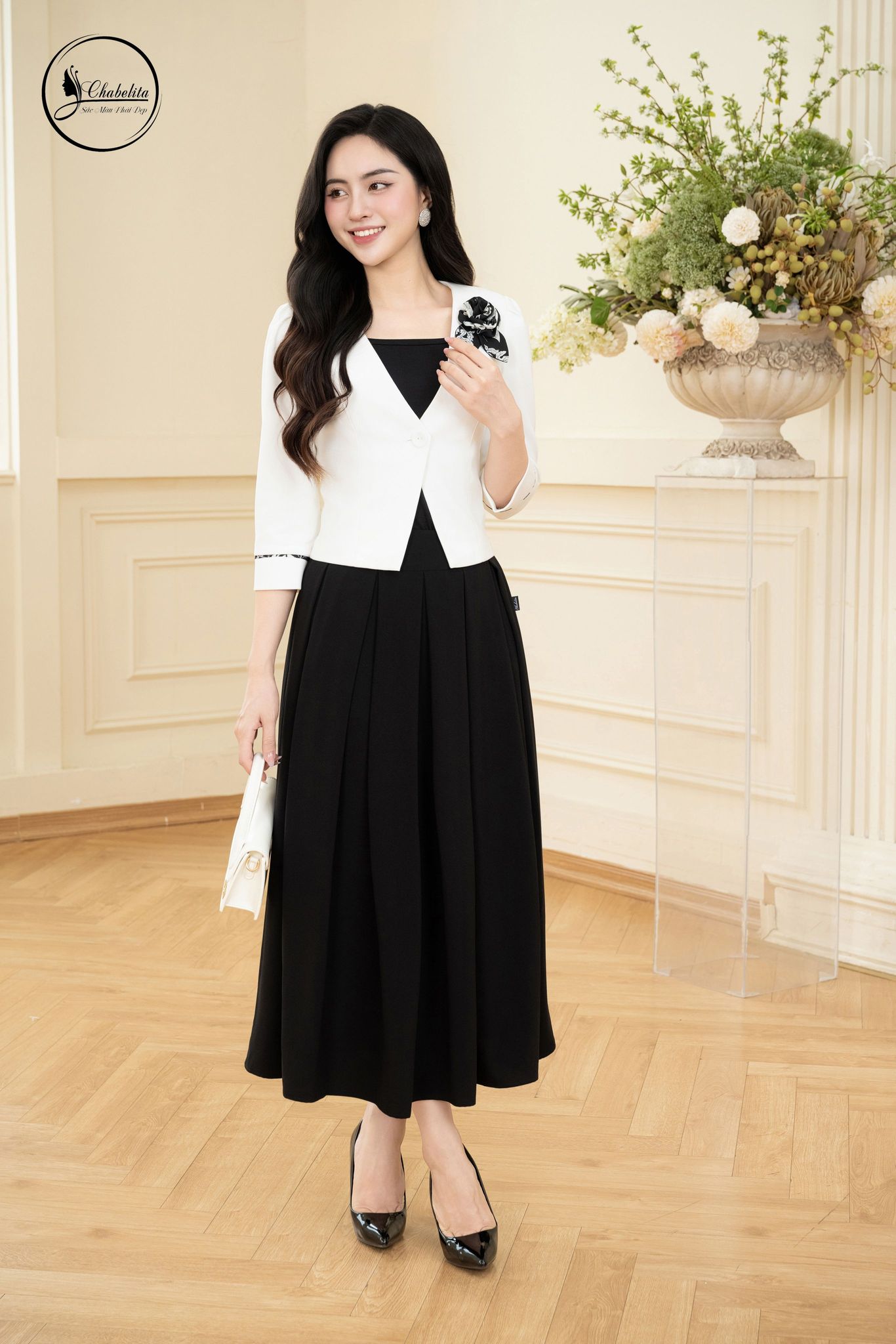 Áo vest 1 khuy tay lỡ màu trắng