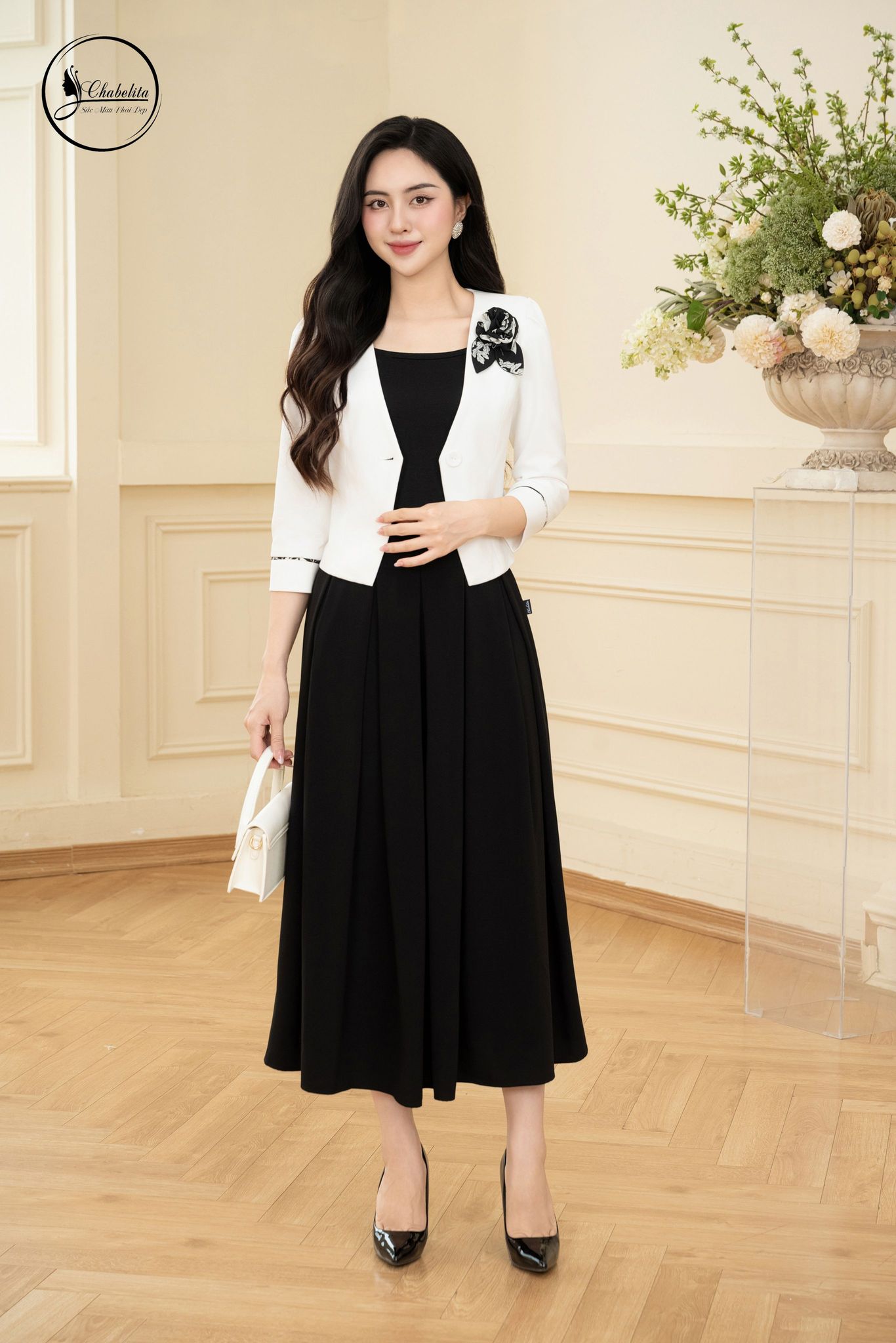Áo vest 1 khuy tay lỡ màu trắng