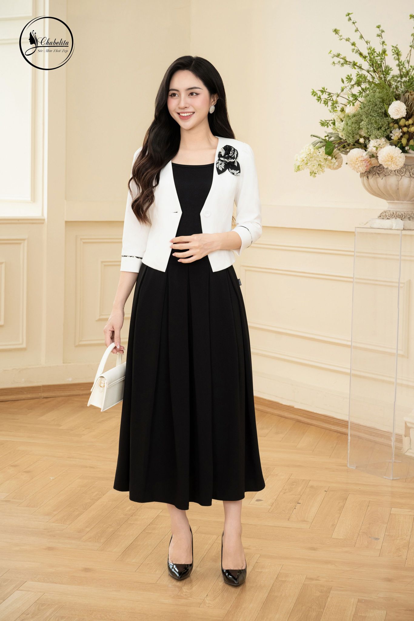 Áo vest 1 khuy tay lỡ màu trắng