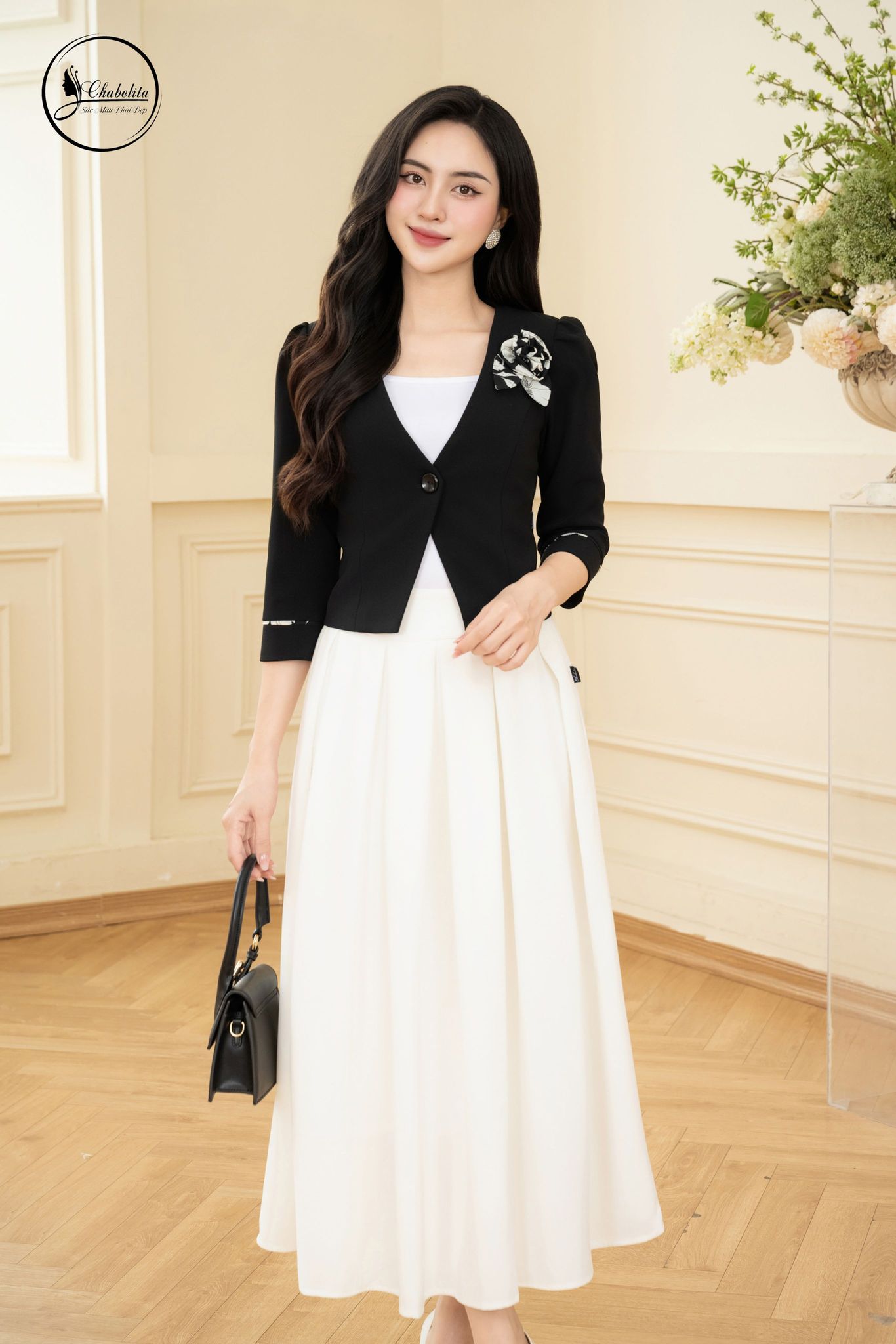 Áo vest 1 khuy tay lỡ màu đen