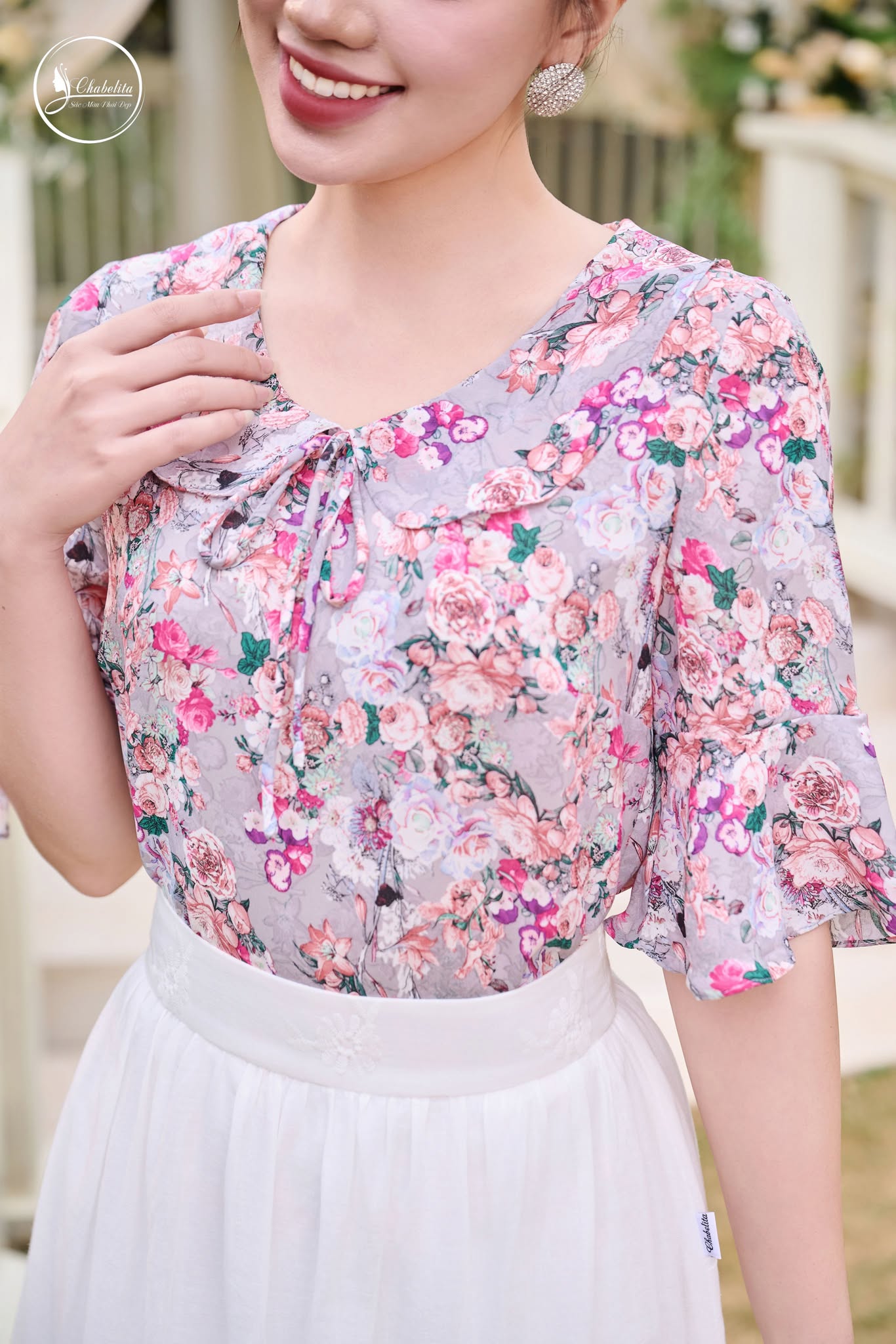 Áo sơ mi hoa cổ sen phối dây nơ màu hồng