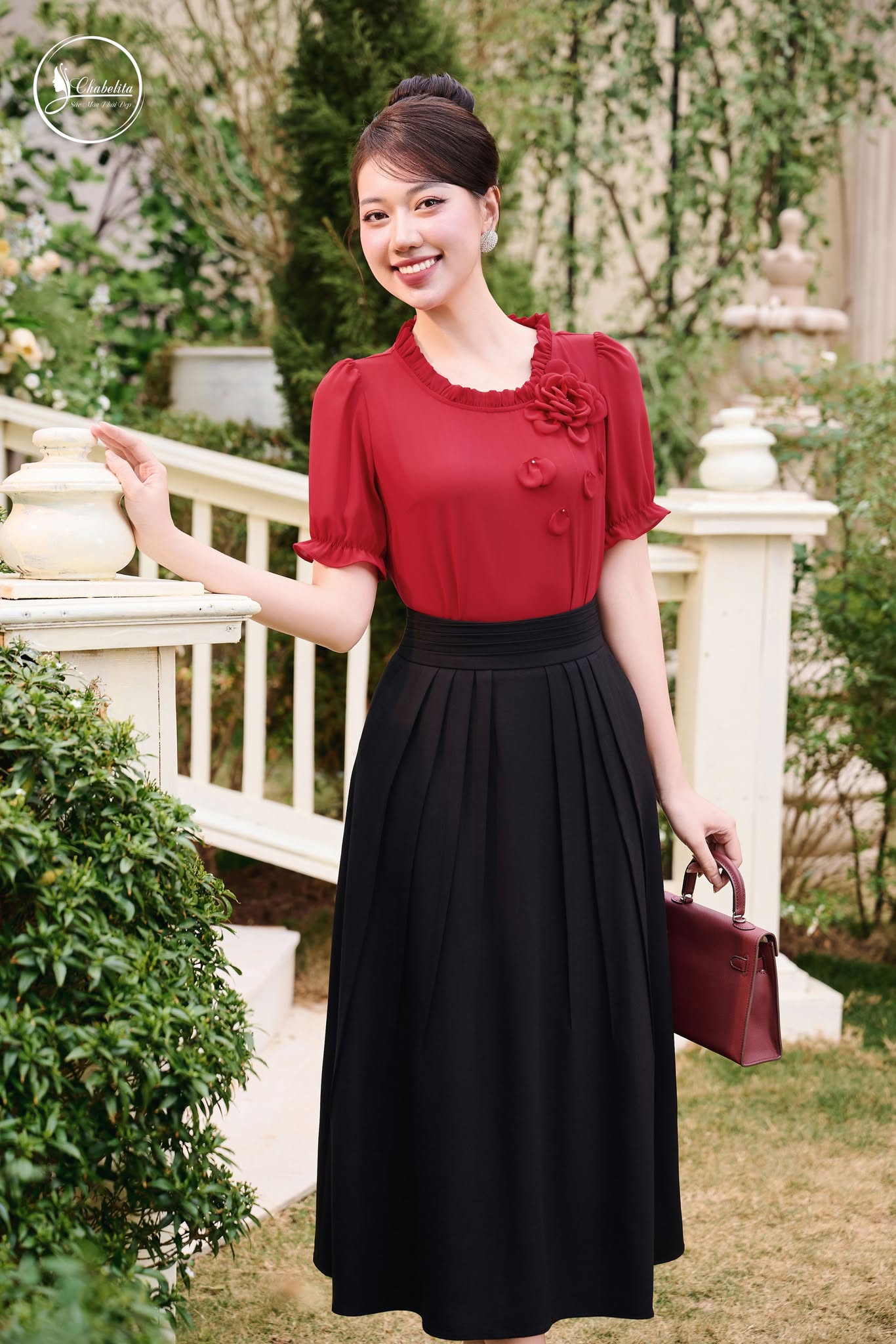 Chân váy xếp ly trước dáng dài màu đen