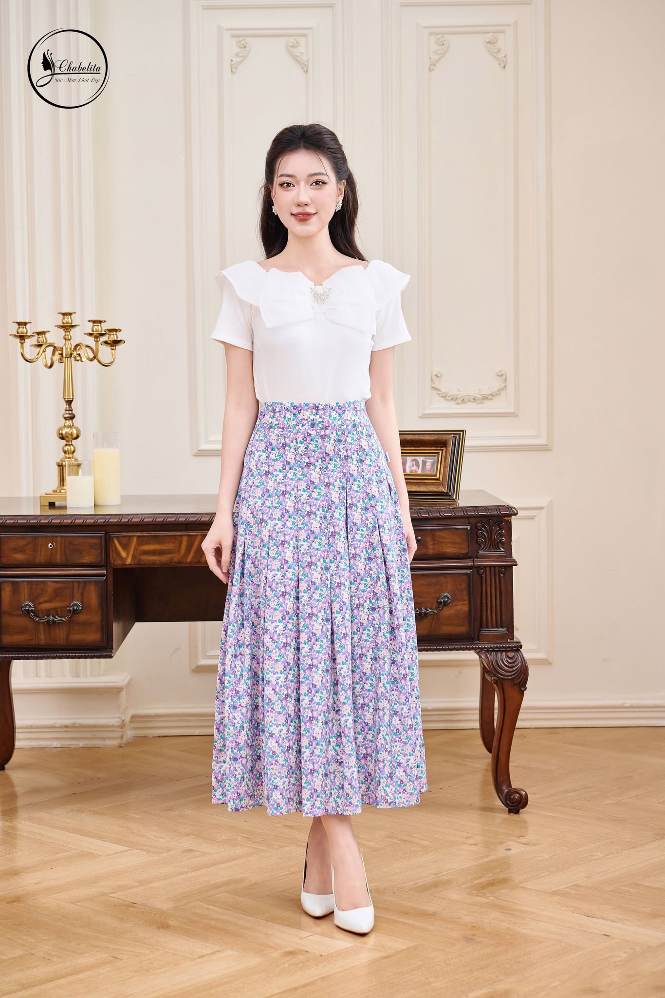 Áo trễ vai cách điệu màu trắng