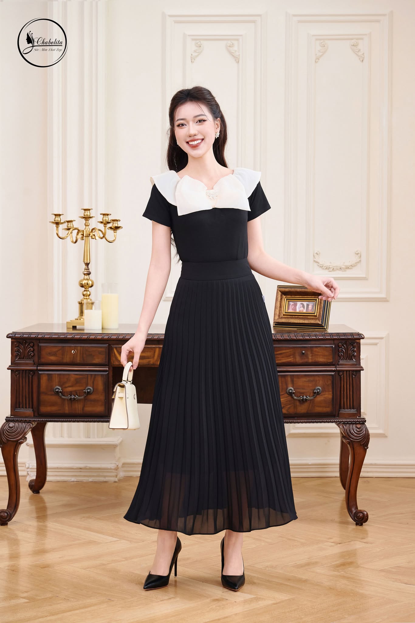 Áo trễ vai cách điệu màu đen