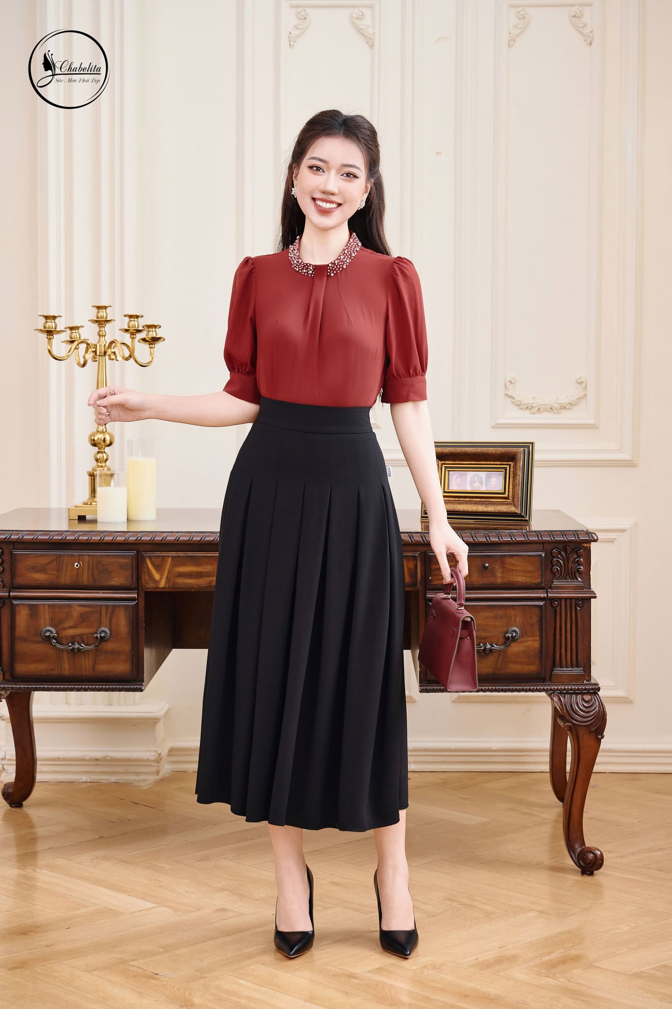 Chân váy xòe xếp ly màu đen