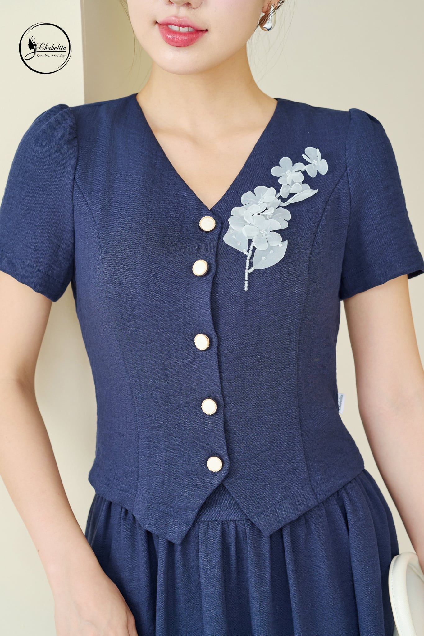 Sét bộ áo tay cộc cổ tim phối chân váy màu xanh than