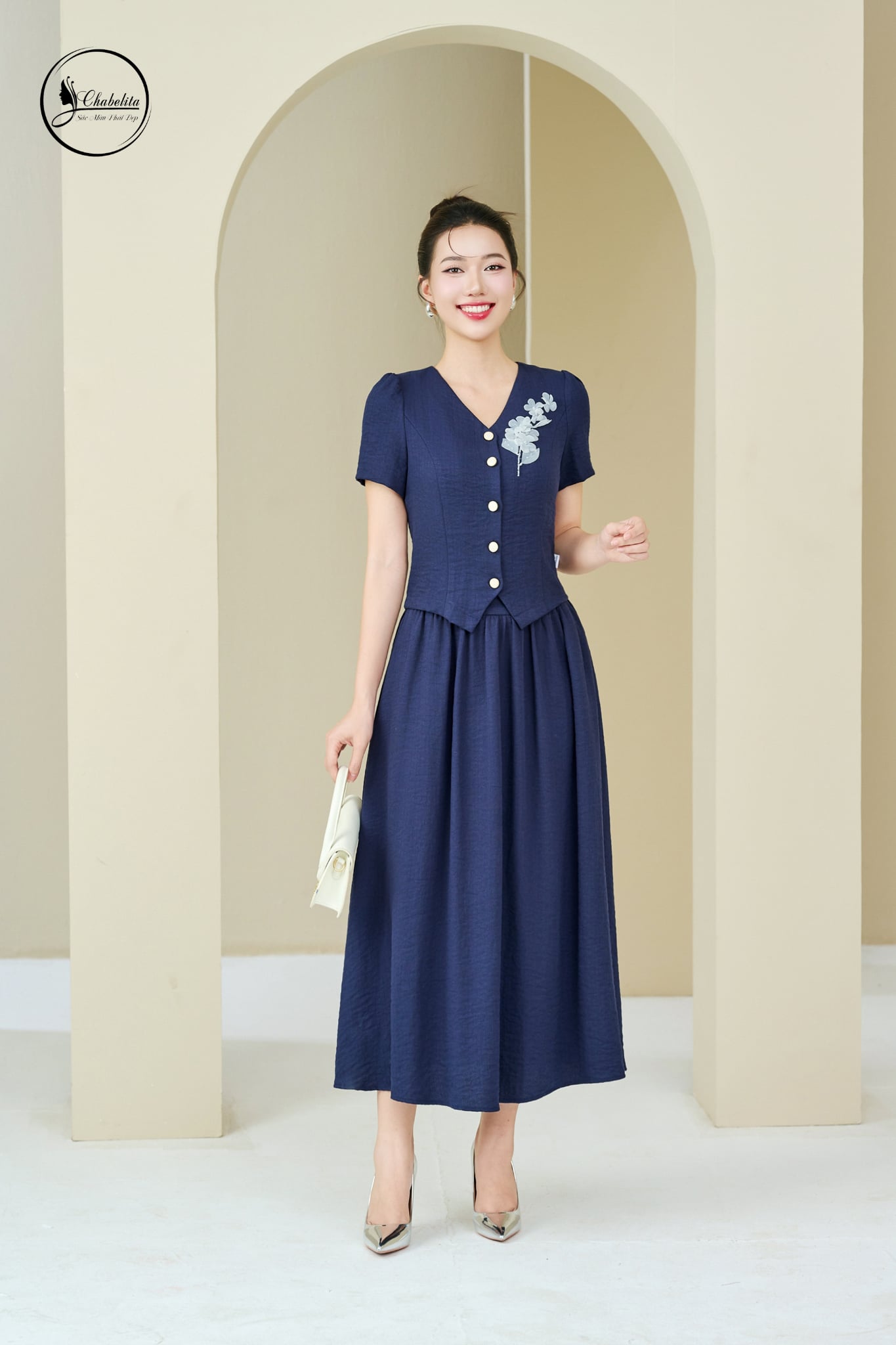 Sét bộ áo tay cộc cổ tim phối chân váy màu xanh than