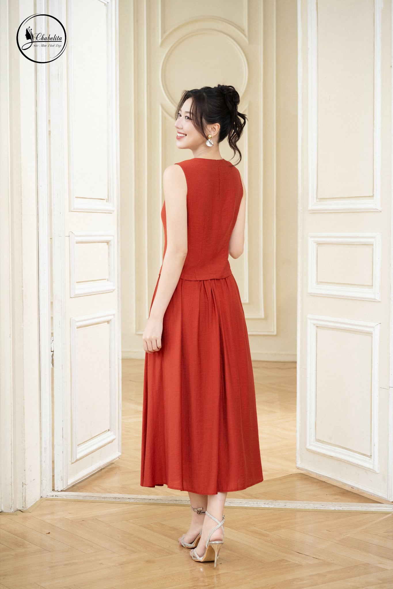 Sét bộ áo sát nách cổ tim phối chân váy màu cam