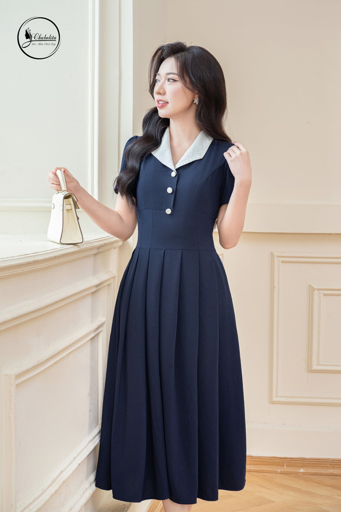 Đầm xòe tay lỡ phối cổ màu xanh than