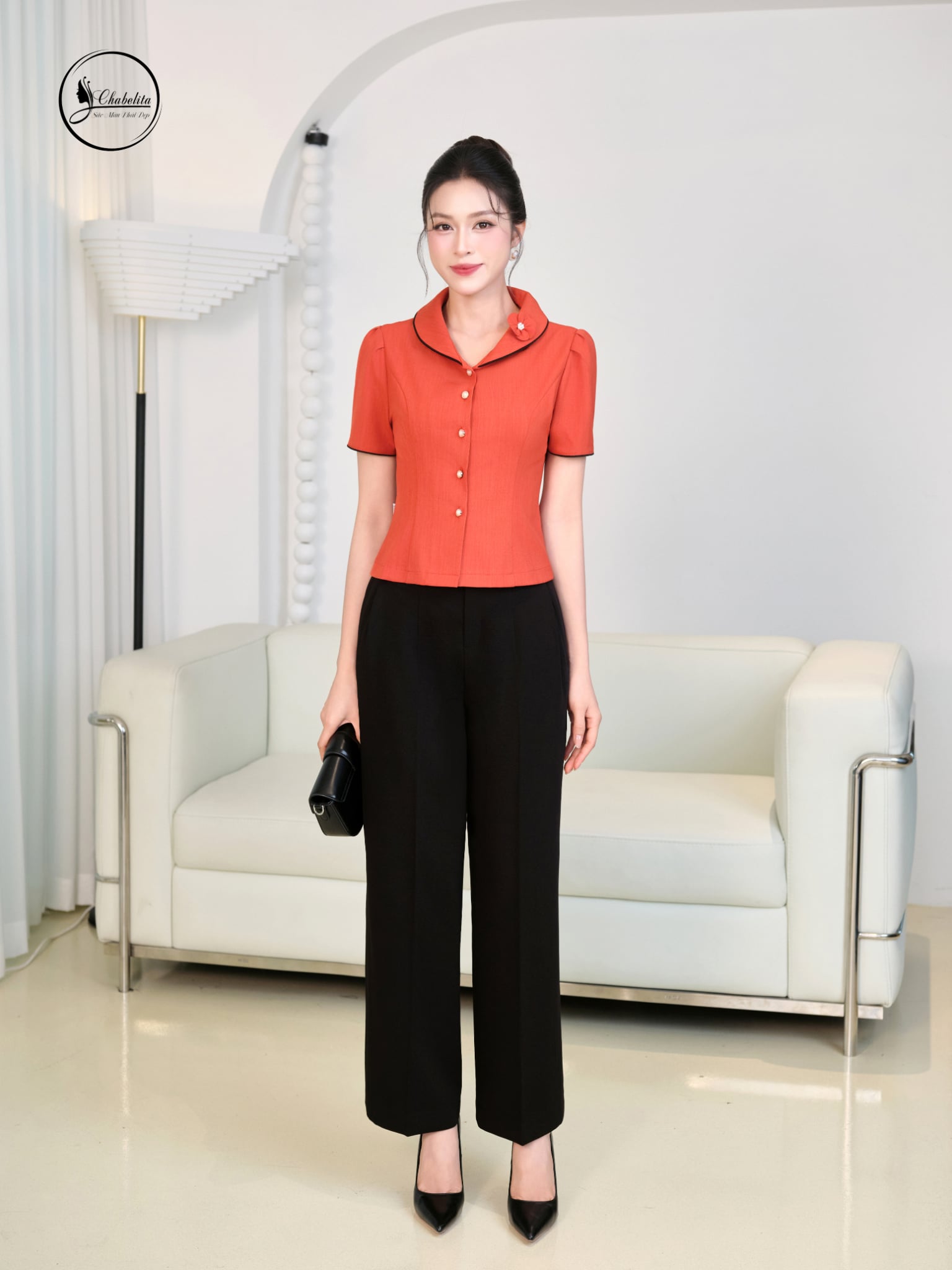 Áo sơ mi cổ sen đính hoa màu cam