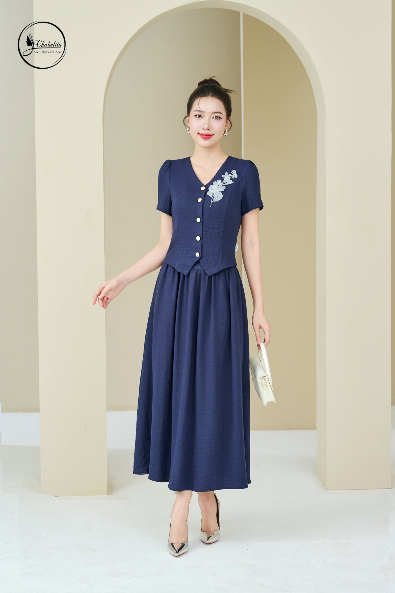 Sét bộ áo tay cộc cổ tim phối chân váy màu xanh than