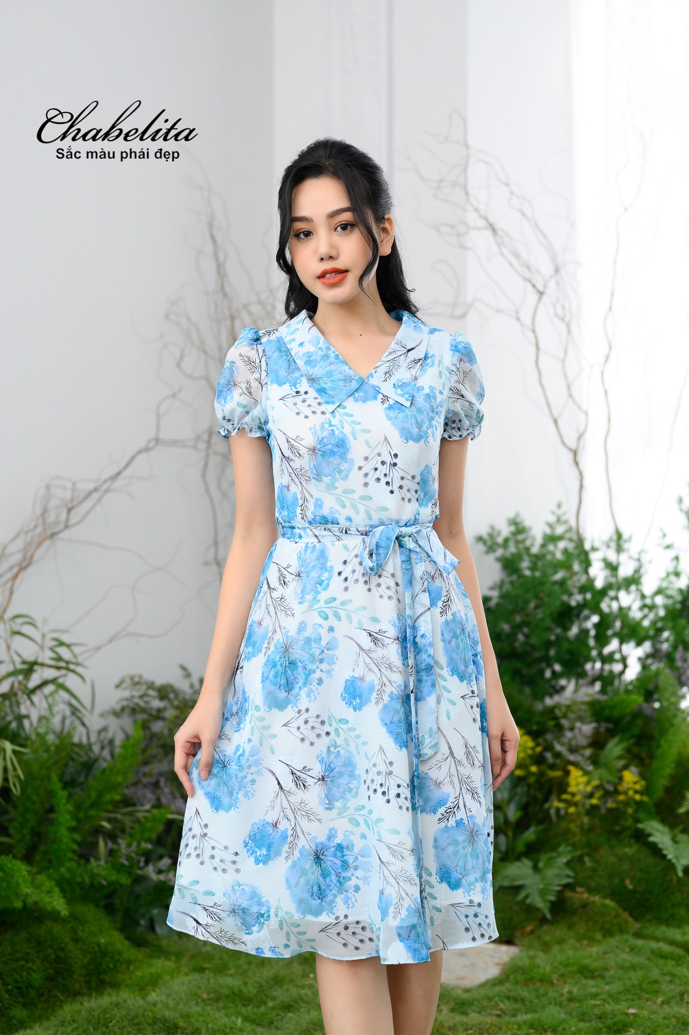 Đầm cổ tim tay loe màu xanh