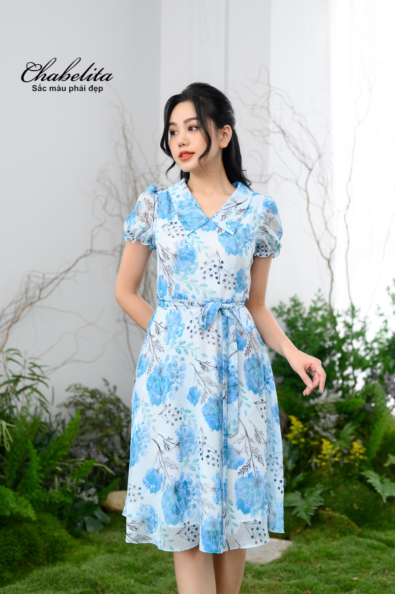 Đầm cổ tim tay loe màu xanh