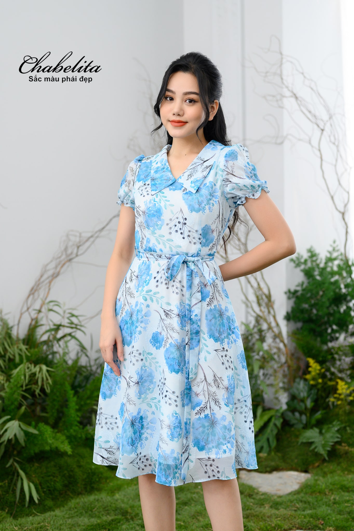 Đầm cổ tim tay loe màu xanh