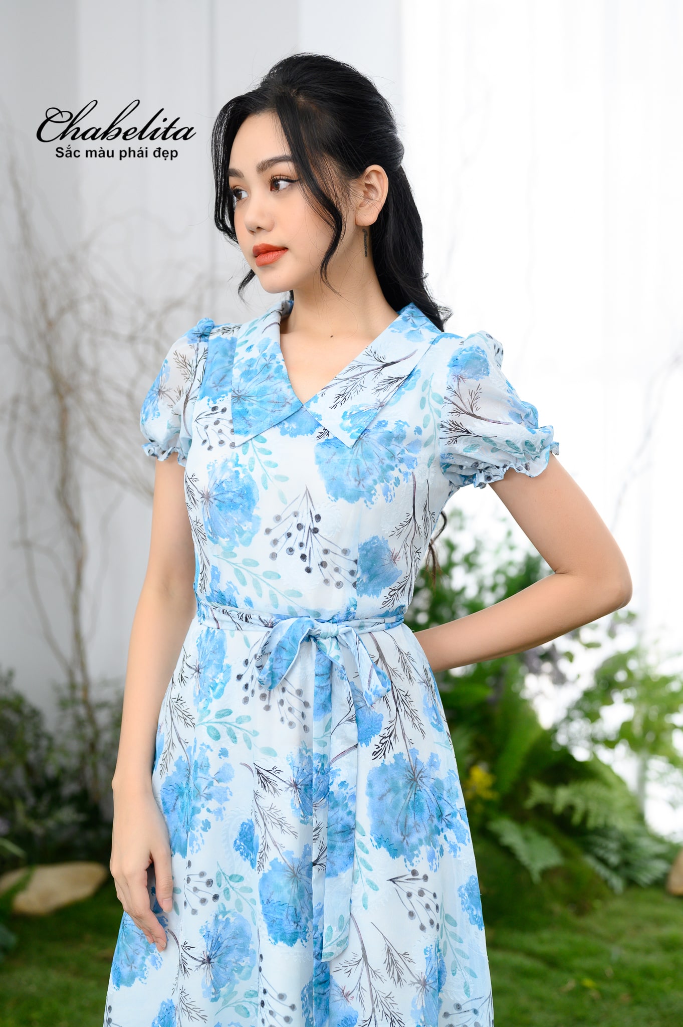 Đầm cổ tim tay loe màu xanh