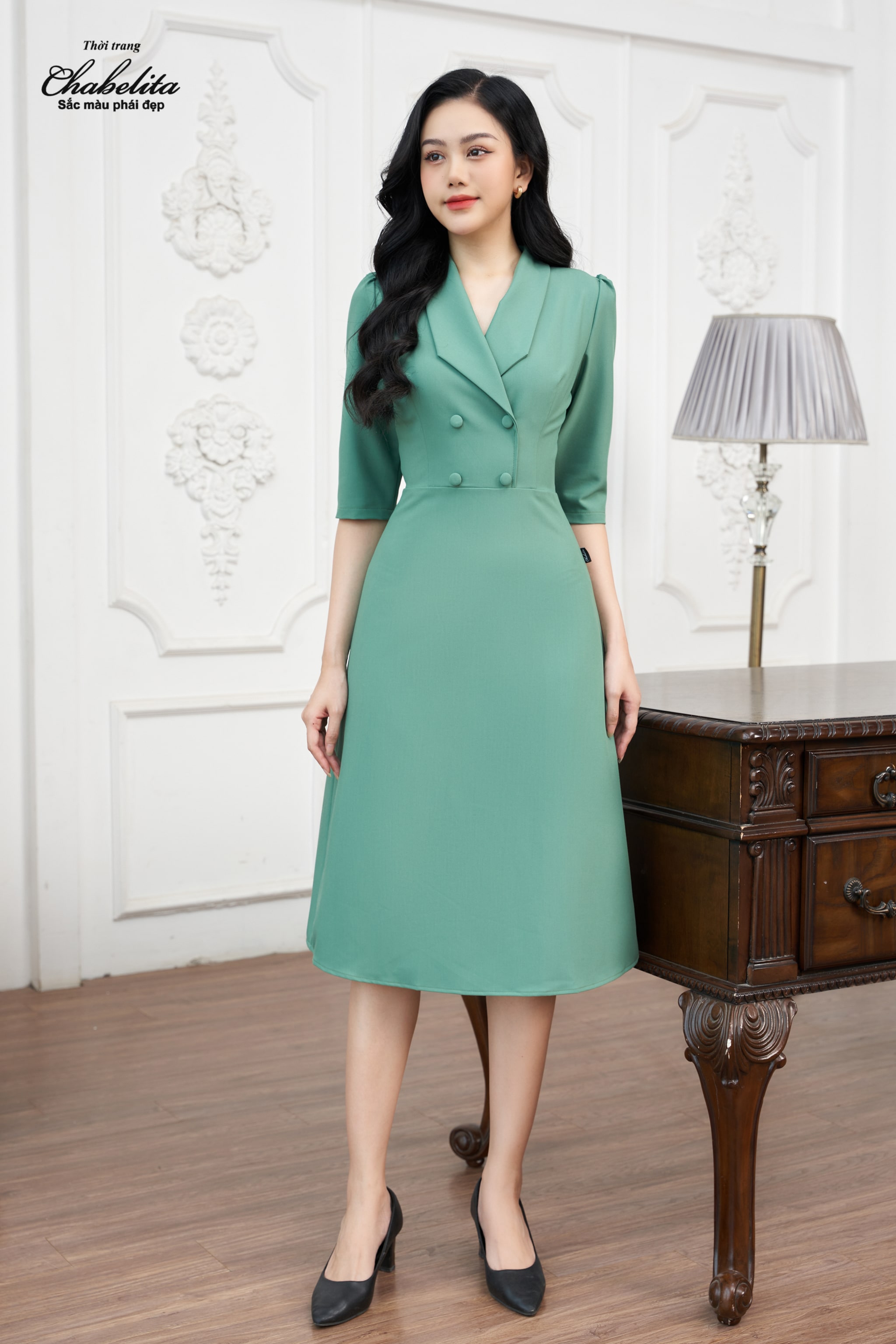 Đầm can eo màu xanh