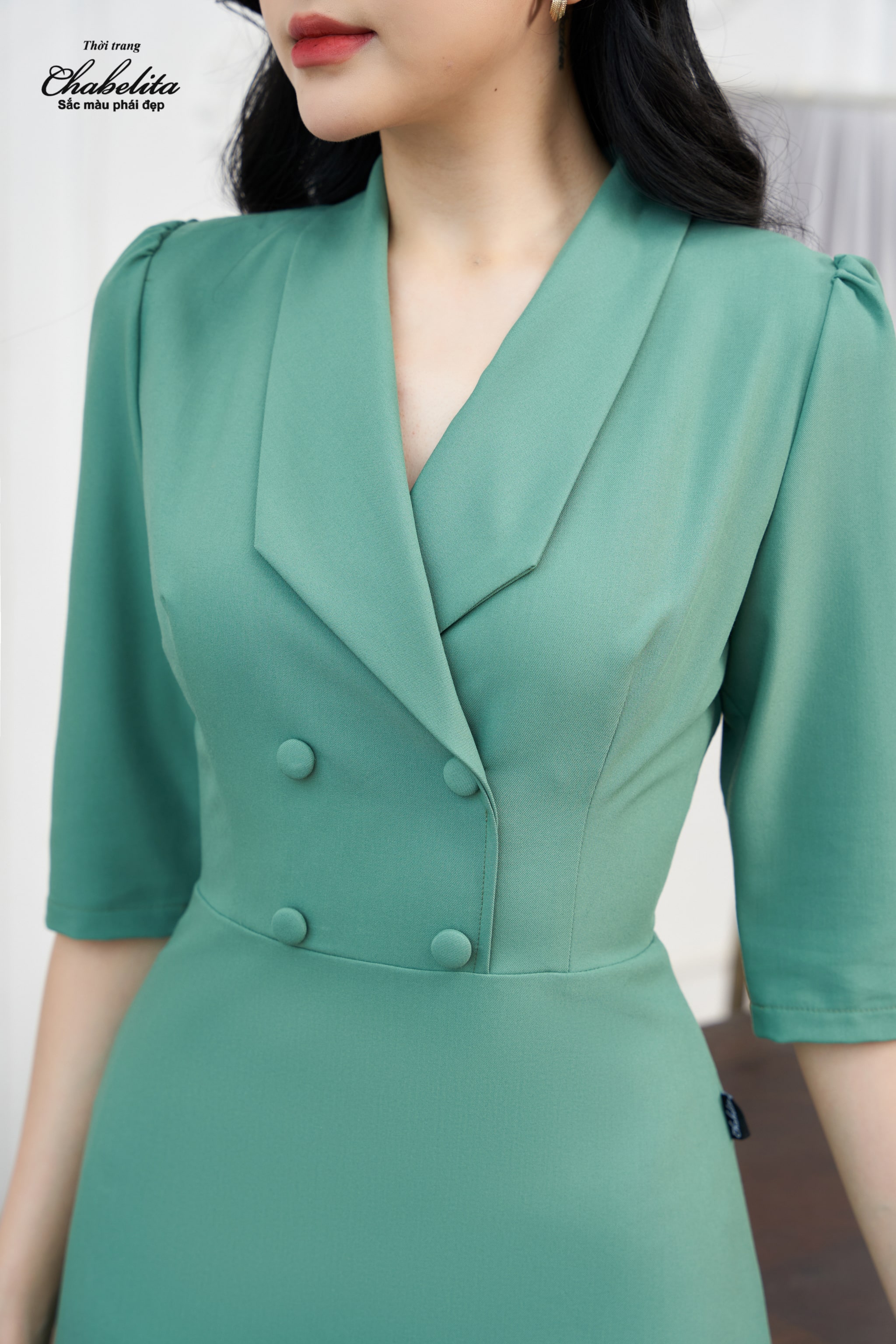 Đầm can eo màu xanh