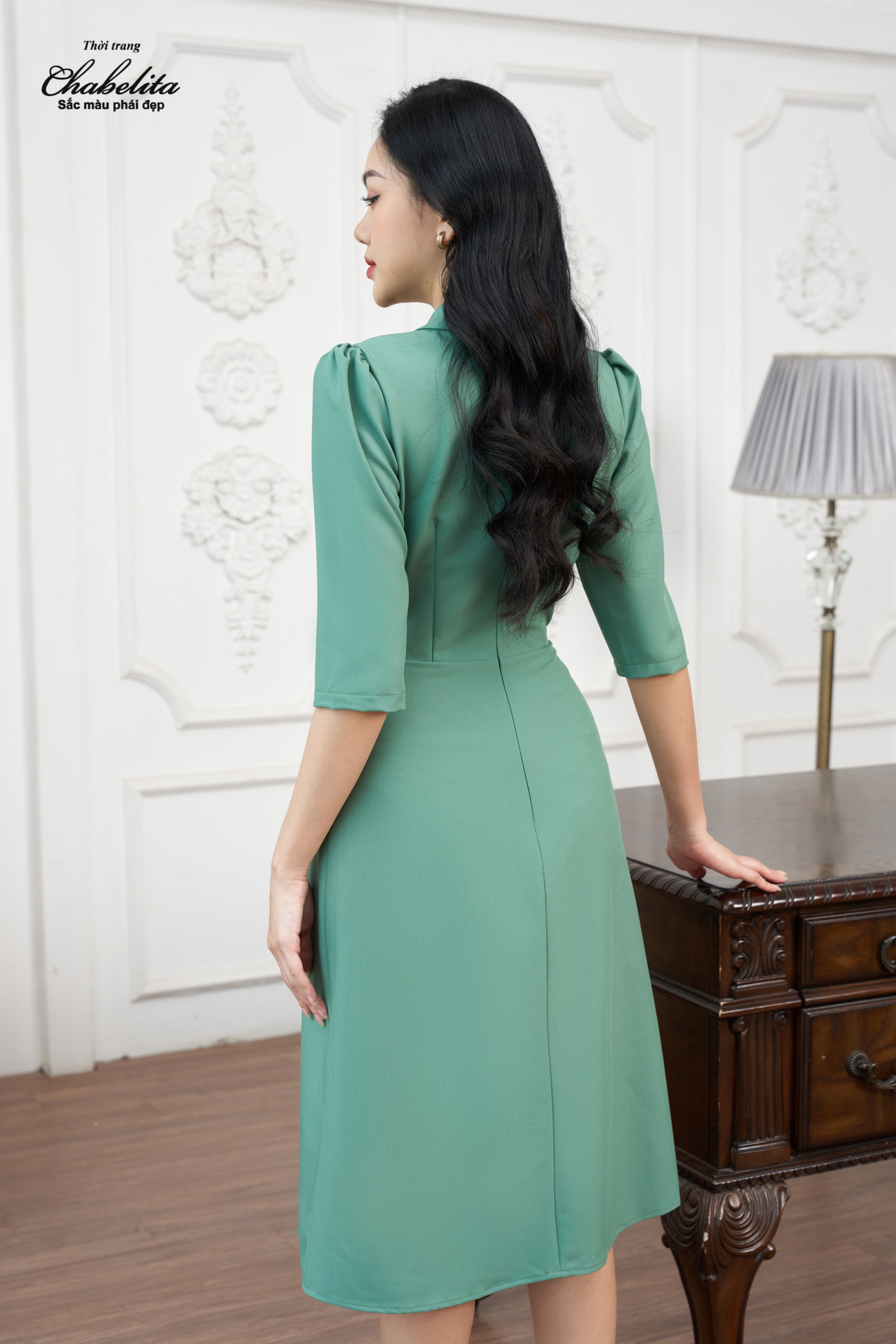 Đầm can eo màu xanh