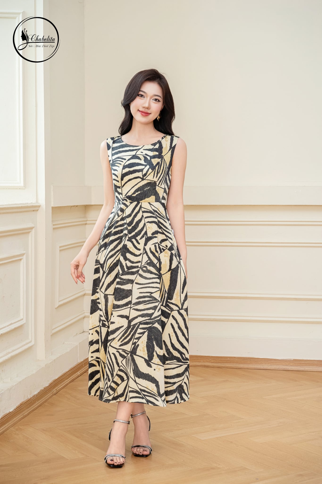 Đầm xòe sát nách họa tiết vàng