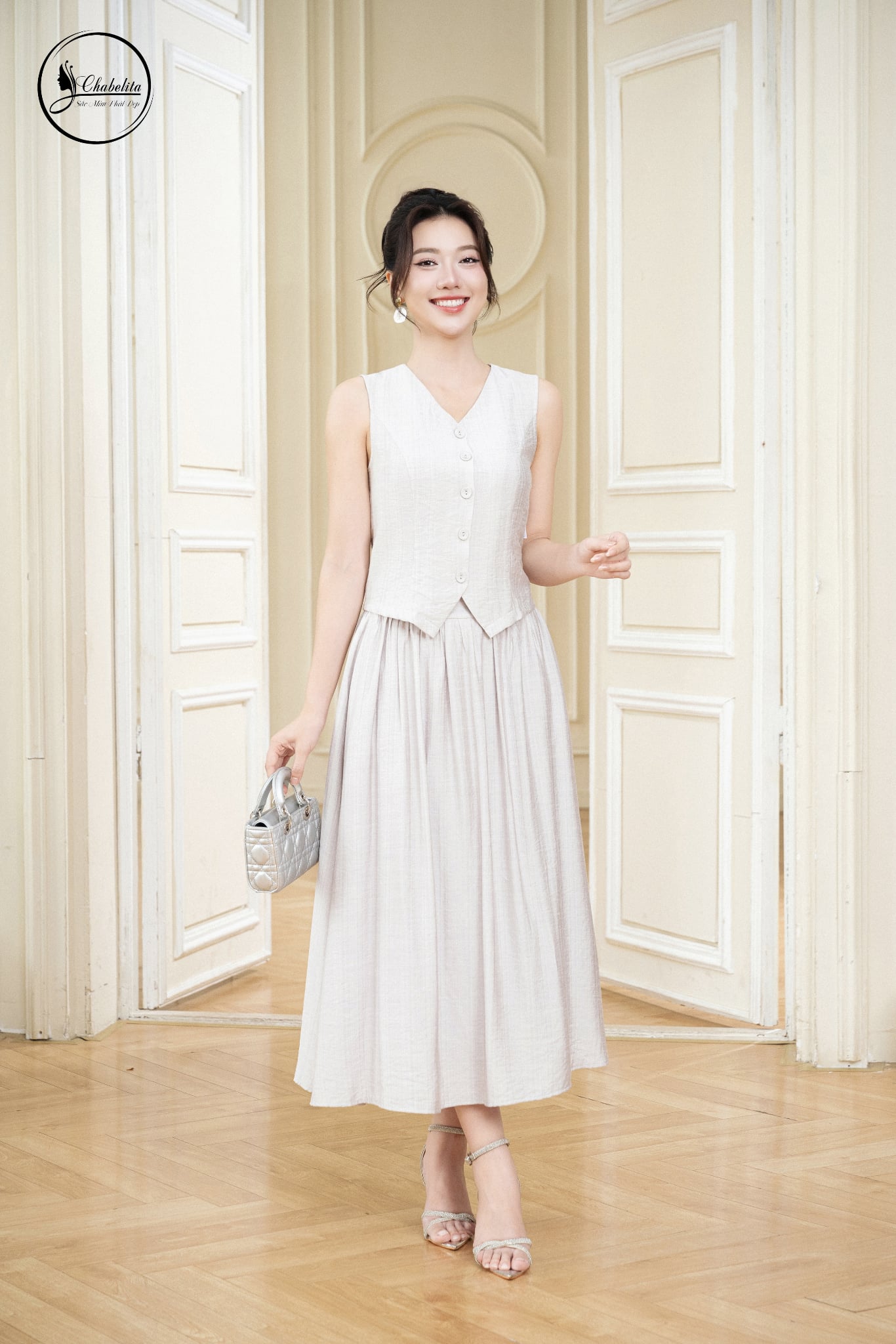 Sét bộ áo sát nách cổ tim phối chân váy màu xám